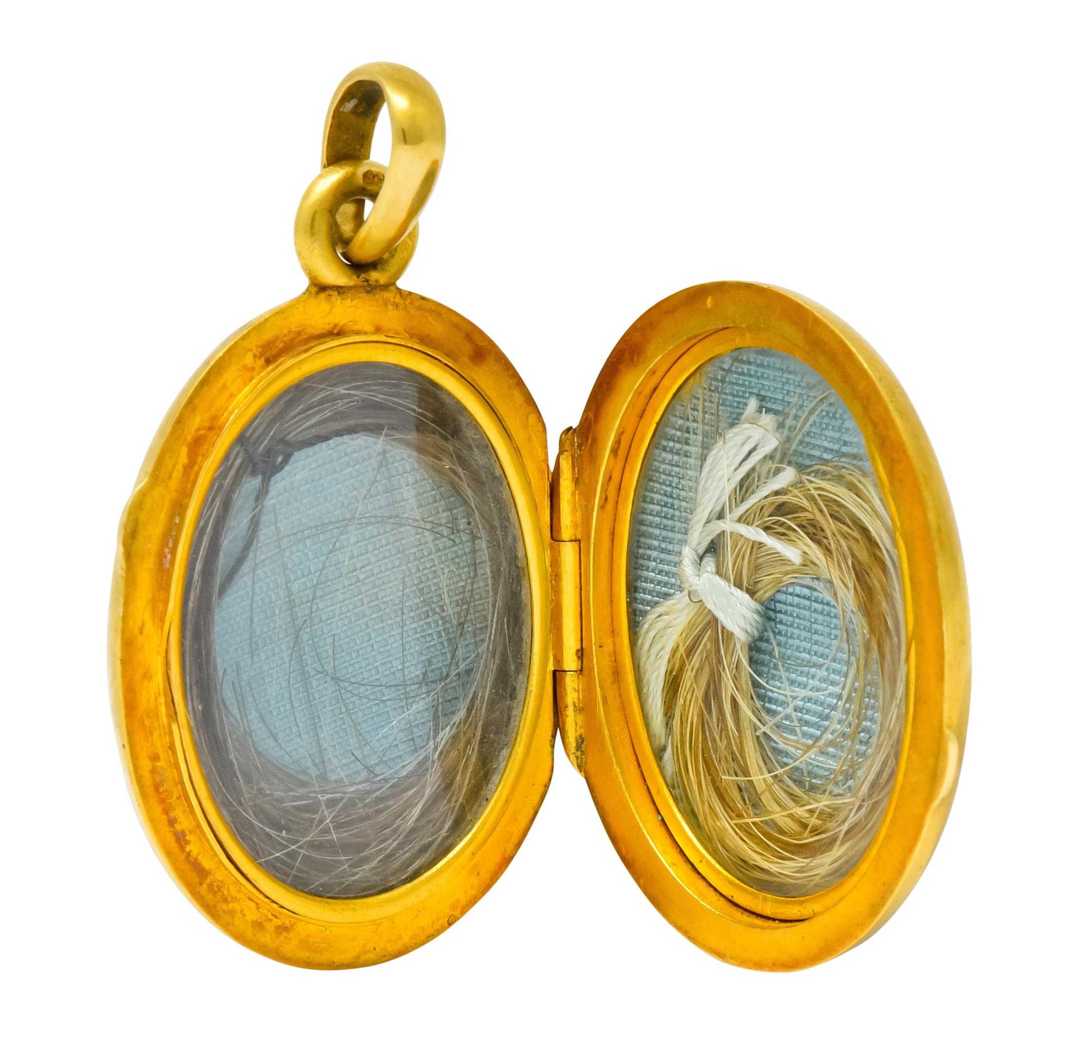 Enameled oval locket depicting two hand painted winged cherubs floating among a cloudy blue sky, no enamel loss, consistent with age, wear, and use

Wings are accented by rose cut diamonds, eye-clean and white

Locket opens on a hinge to reveal two