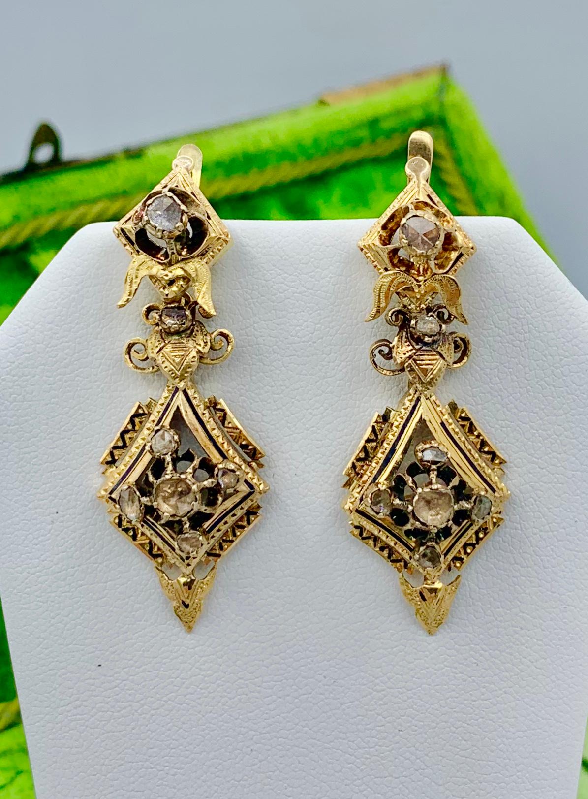 This is very rare pair of early Rose Cut Diamond Antique Georgian - Victorian Dangle Drop Day Night Earrings in 18 Karat Gold with Enamel adornment.   These antique earrings are of the highest quality.  They have extraordinary design with three