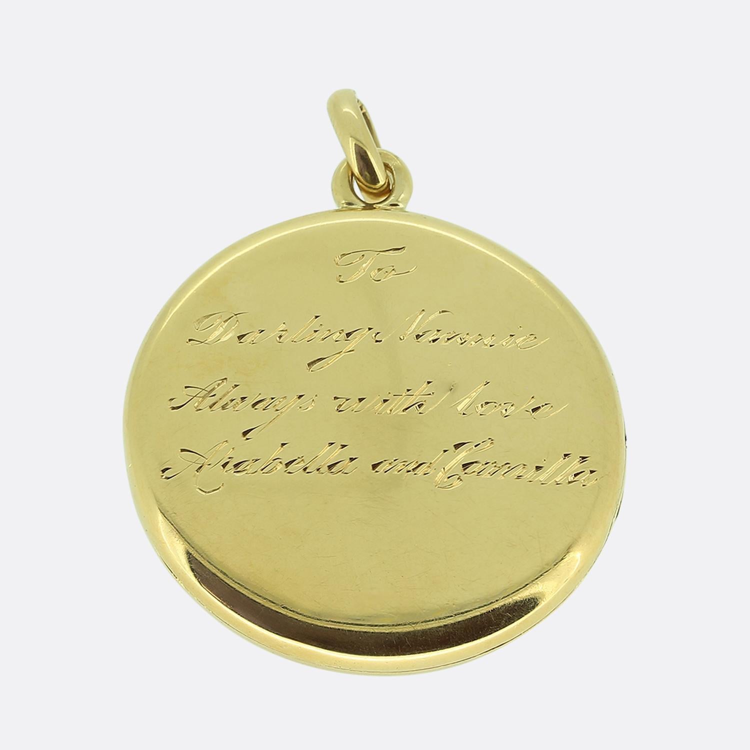 Here we have a distinguished locket pendant showcasing a charming design. This piece is meticulously fashioned from 15ct yellow gold, exuding a warm, lustrous glow. The locket's face is adorned with an elegant arrangement of shimmering rose-cut