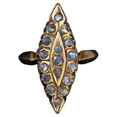 Anillo victoriano de oro de 14 quilates con navette de diamantes talla rosa