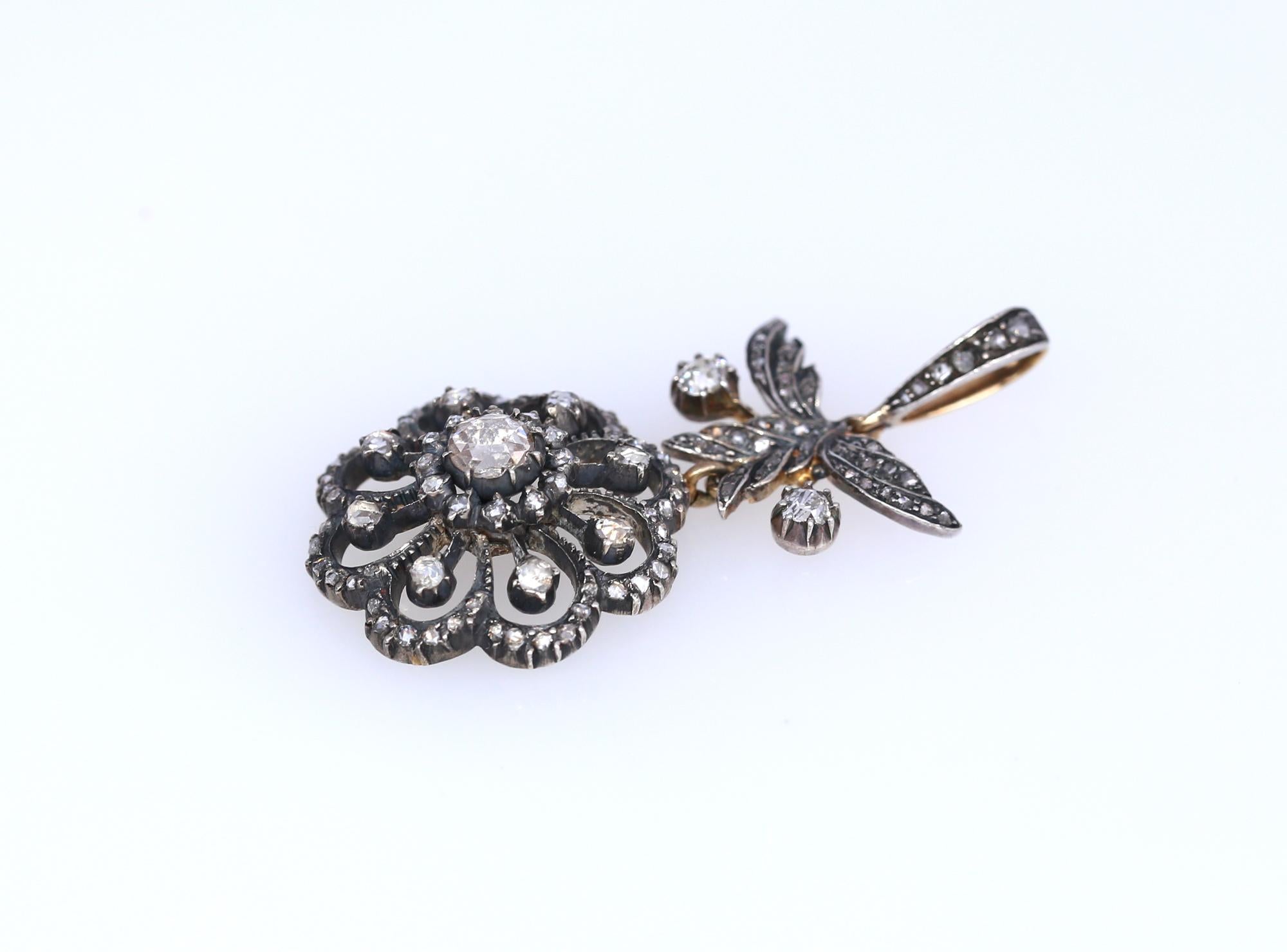 Victorian Pendant Rose-Cut Diamonds Flower, 1890
Victorian Rose-cut Diamonds Pendant depicting a flower. A fine pendant consists of three parts interlinked to be moving freely on the body. This a superb example of the late Victorian era. Executed