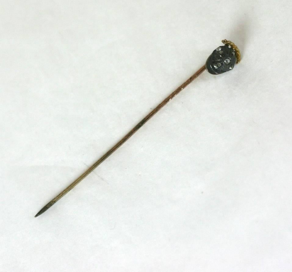 Victorian Jockey's cap stickpin of patinaed silver with rose cut diamonds, on a shaft of twisted 14 karat gold. 1890's USA. 
Excellent Condition. 

