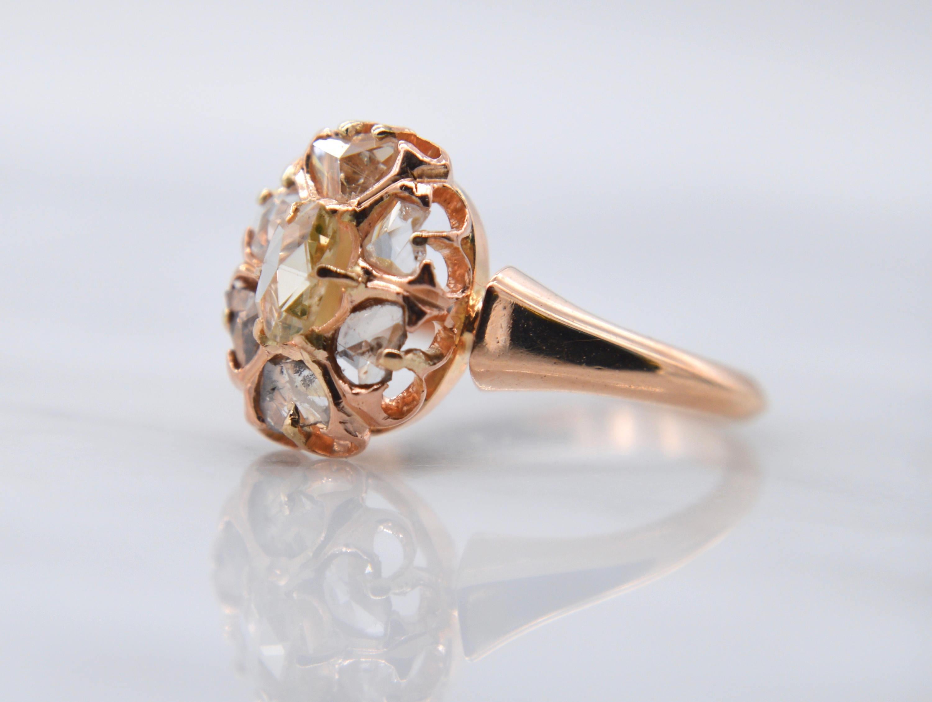 Beautiful antique late 1800s Victorian era total .45 carat rosecut diamond cluster halo 14K rose gold ring. Size 5.75, can be resized by a jeweler. The diamonds have been graded as color H, clarity VS2. Gold is unmarked but tested as solid 14K. The