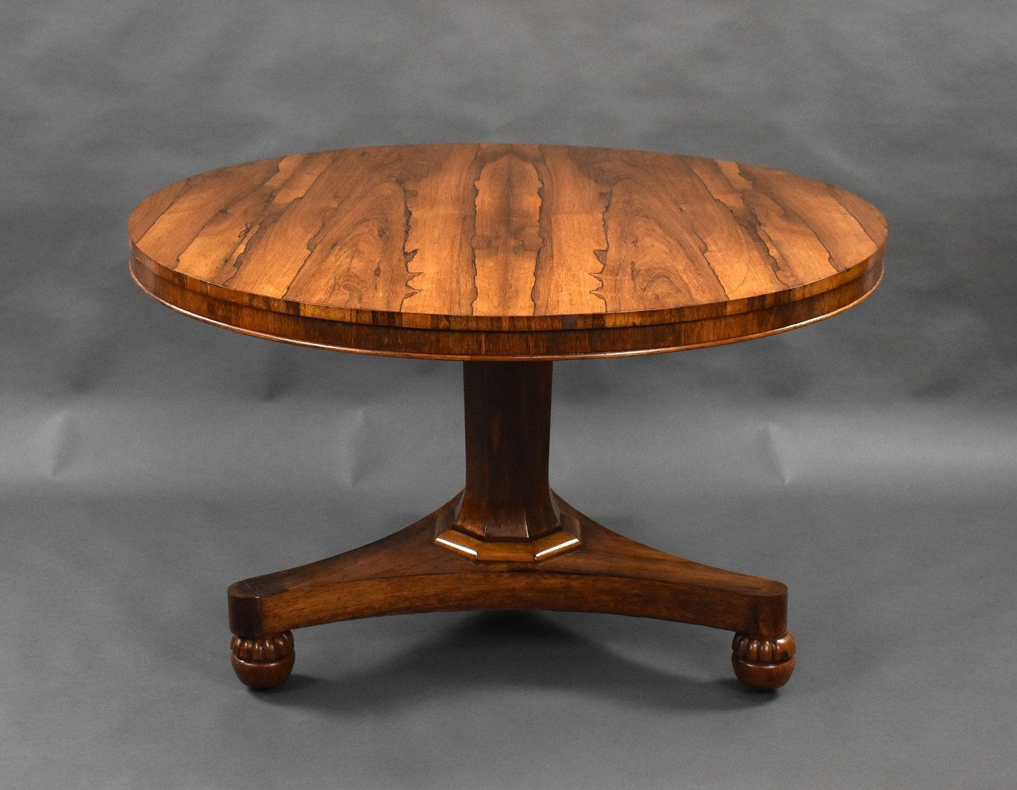 For sale is a good quality Victorian rosewood breakfast table, having a well figured top above a tapered stem, terminating on its base, raised on bun feet. The table is in very good condition, showing minor signs of wear commensurate with age and
