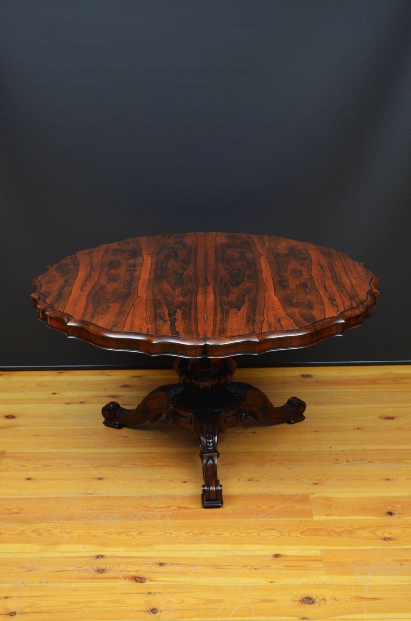 Sn5571 Exceptional quality Victorian tilt top centre table in the manner of Robert Strahan & Co Dublin, having well figured top with outstanding rosewood grain and pie crust moulded edge raised on vase shaped column with carved scrolls and shamrock