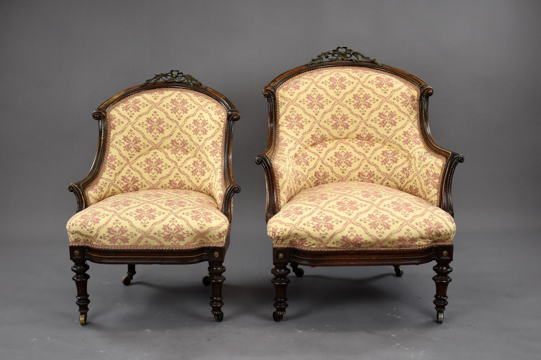 Victorian Rosewood ladies and gentleman armchairs in good condition. The chairs have decorative brass work to the top of each chair and brass beading to the outer edges and decorative motive to each leg. The chairs stand on turned legs to the front