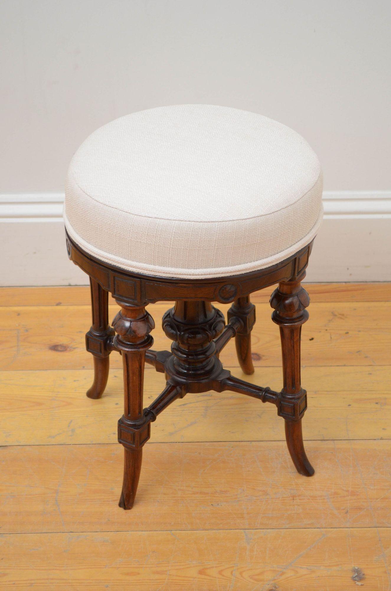 Sn5369 Fine quality and very attractive Victorian rosewood piano stool, having generous height adjustable newly upholstered seat above carve frieze, standing on petal carved, reeded and outswept legs united by turned stretchers. This antique stool