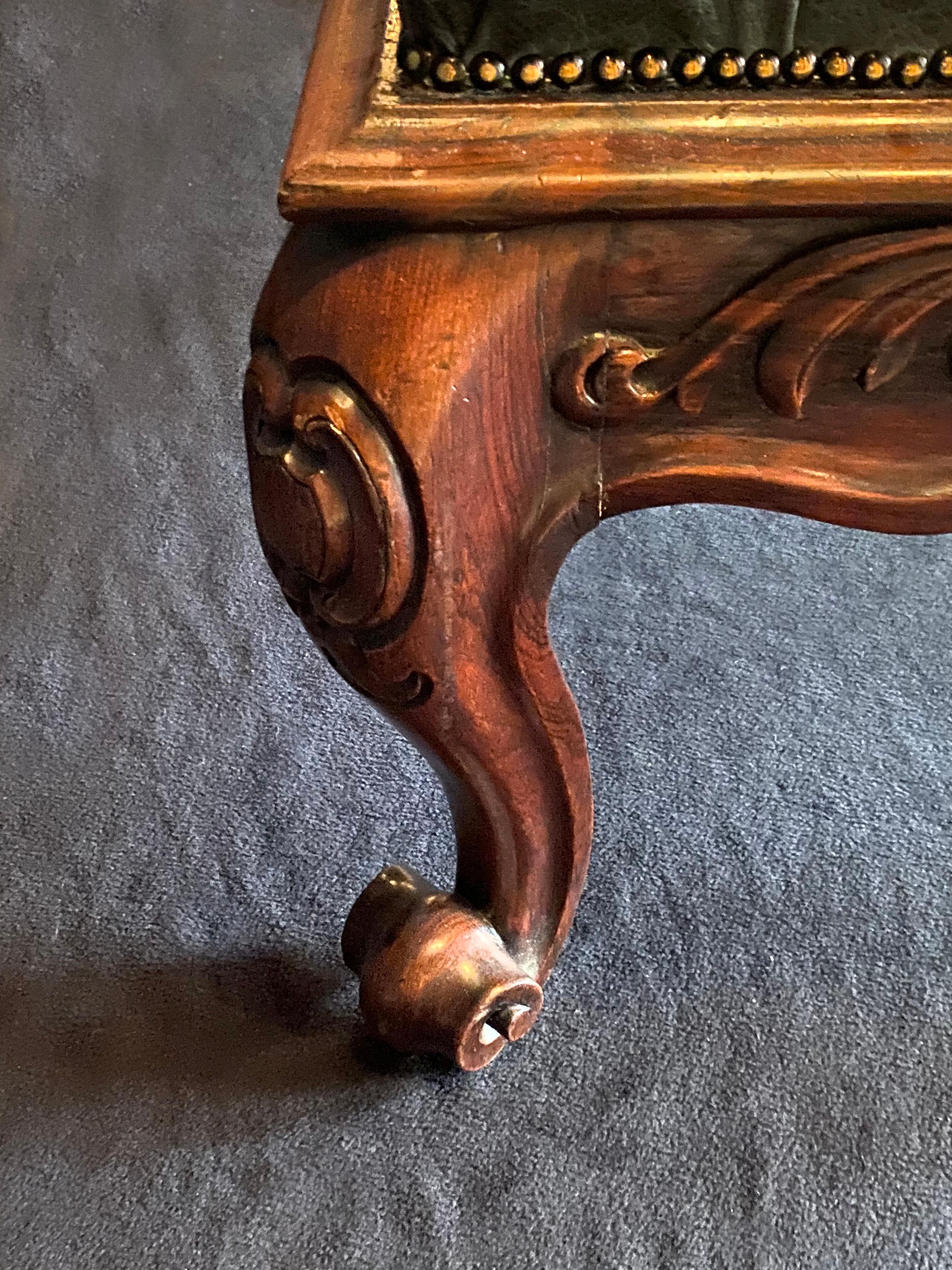 A superb quality mid 19th century rosewood salon stool of Rococo revival style. The frieze is eye-catching with intricate cavetto carved moulding - it is a wonderful example of the Rococo revival style which epitomised grandeur and luxury in