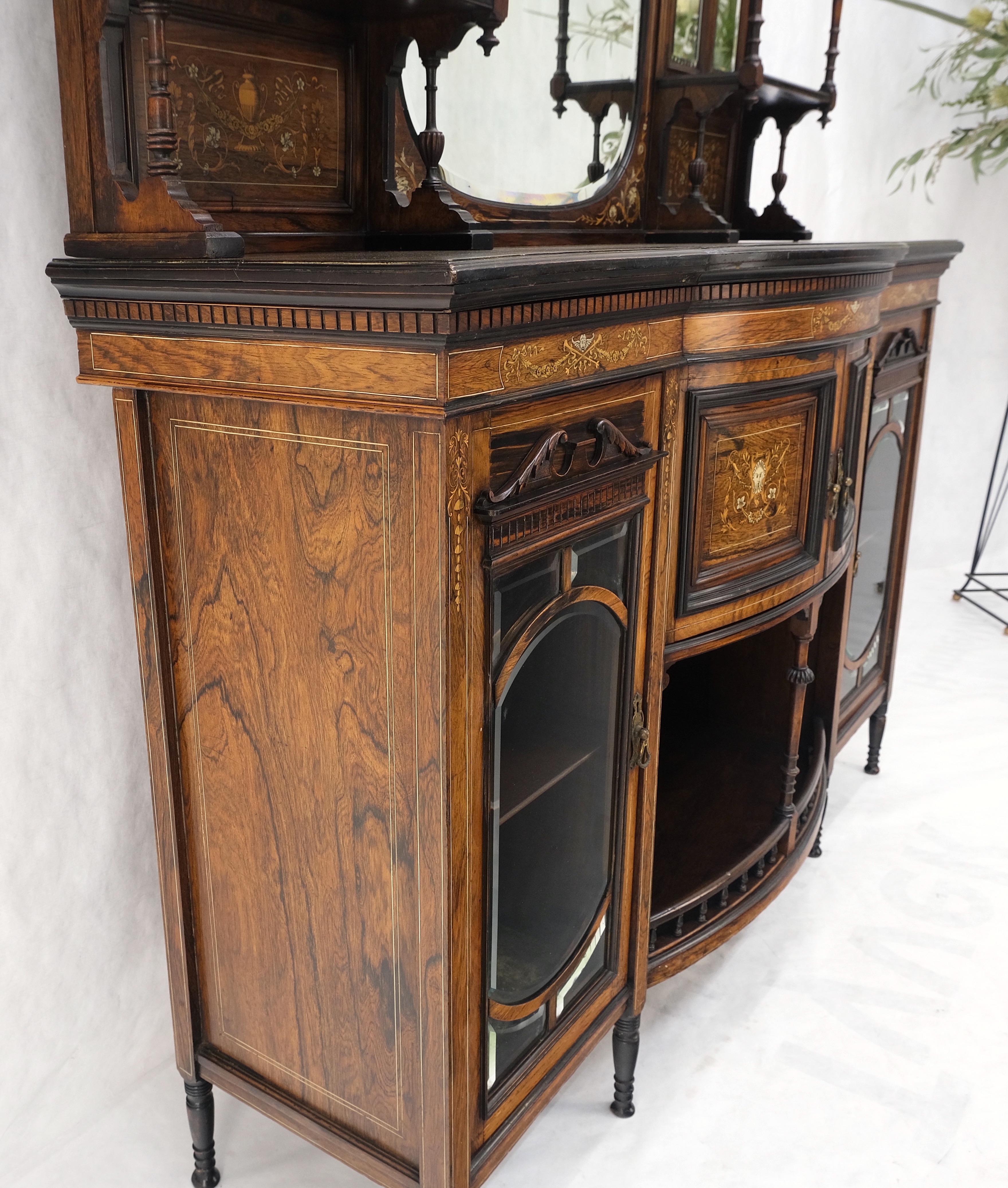 Victorian Rosewood Sideboard Credenza Etagere Display Cabinet Beveled Glass MINT.
Lots of fine carving and turned parts all complete. The two smaller side mirrors can be resilvered to make it perfect condition.