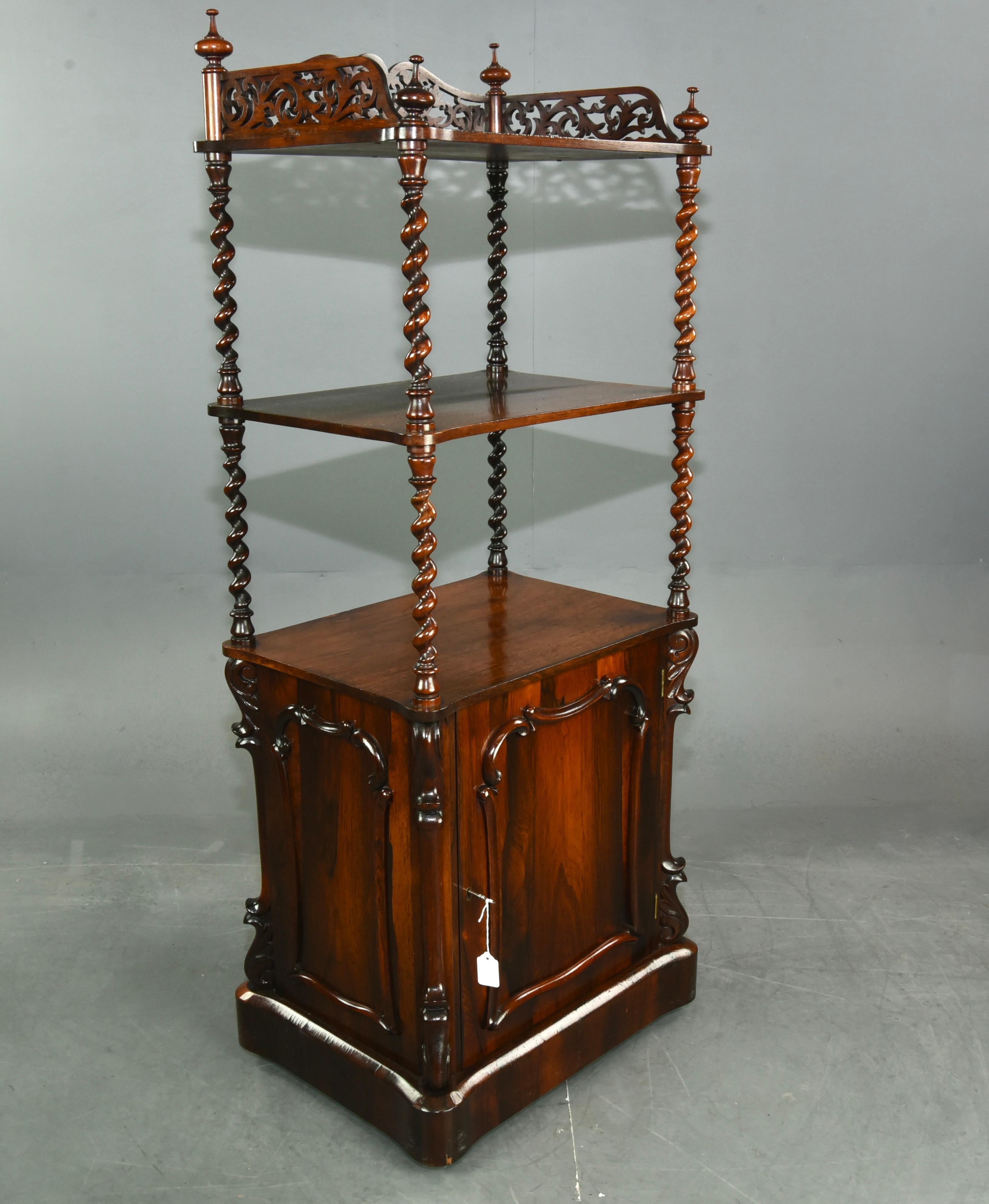 Fine Quality Early Victorian Rosewood three tier whatnot.
It is very good condition with no breaks or woodworm a wonderful colour with a great grain.
The shelves are supported by very fine barley twist columns the top shelf has a wonderful