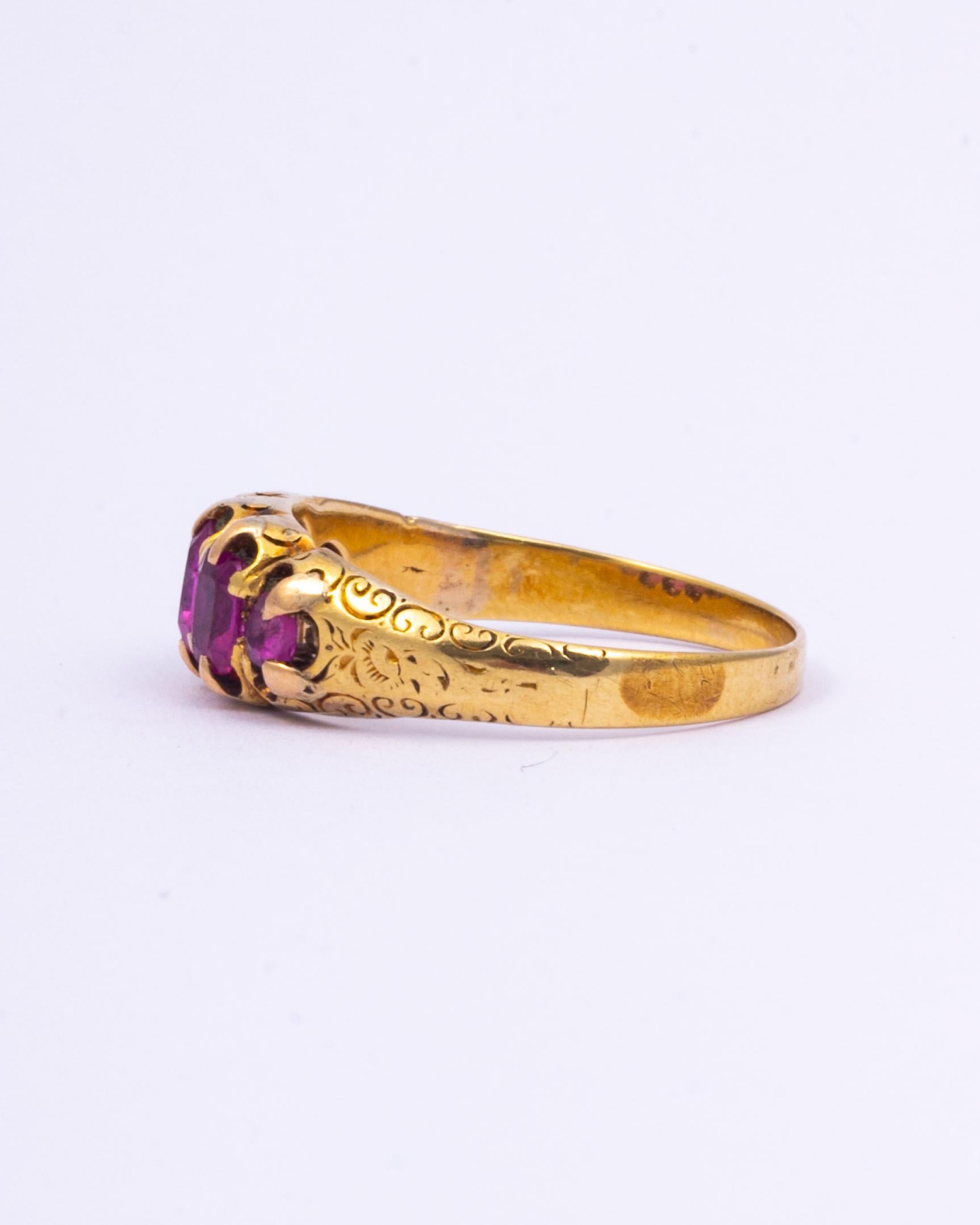 This victorian Ruby ring is adorned with five wonderful rubies set in smooth settings. All set in a beautiful 15ct Yellow Gold and has delicately engraved shoulders. A truly stunning antique ring that would make a fabulous family heirloom.

Ring
