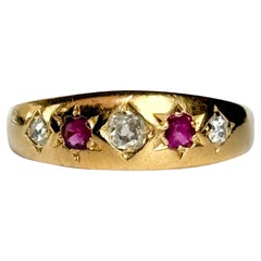 Antique Victorian Ruby and Diamond 18 Carat Gold Five-Stone Star Setting Ring