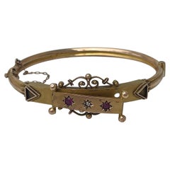 Armreif aus 9 Karat Gelbgold mit viktorianischem Rubin und Diamant