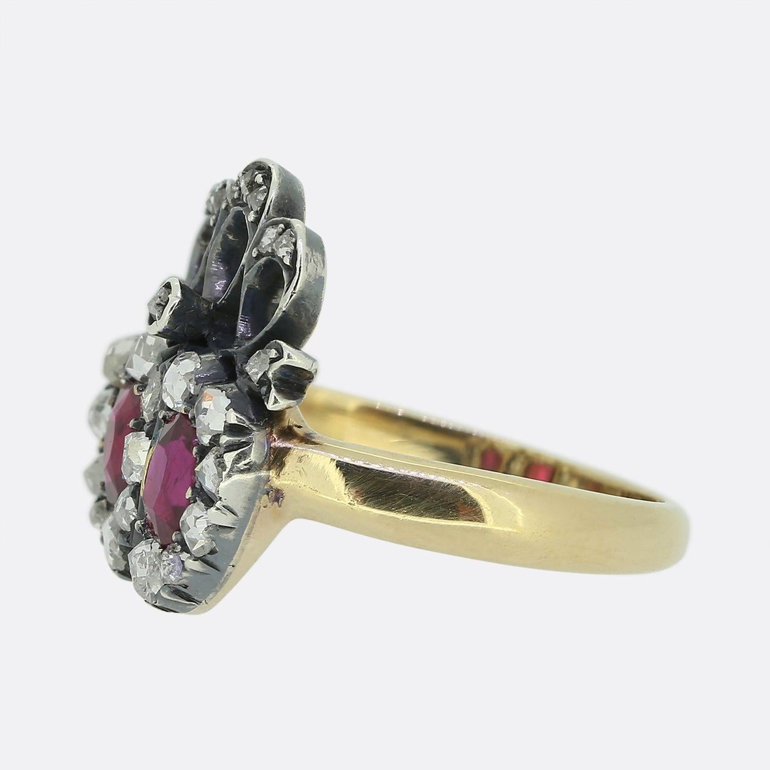 Here we have a beautifully crafted Victorian double heart ring. In this case, a duo of perfectly matched oval faceted rubies possessing a vivd red colour tone have been individually circulated by an array of rose cut diamonds. Both clusters are