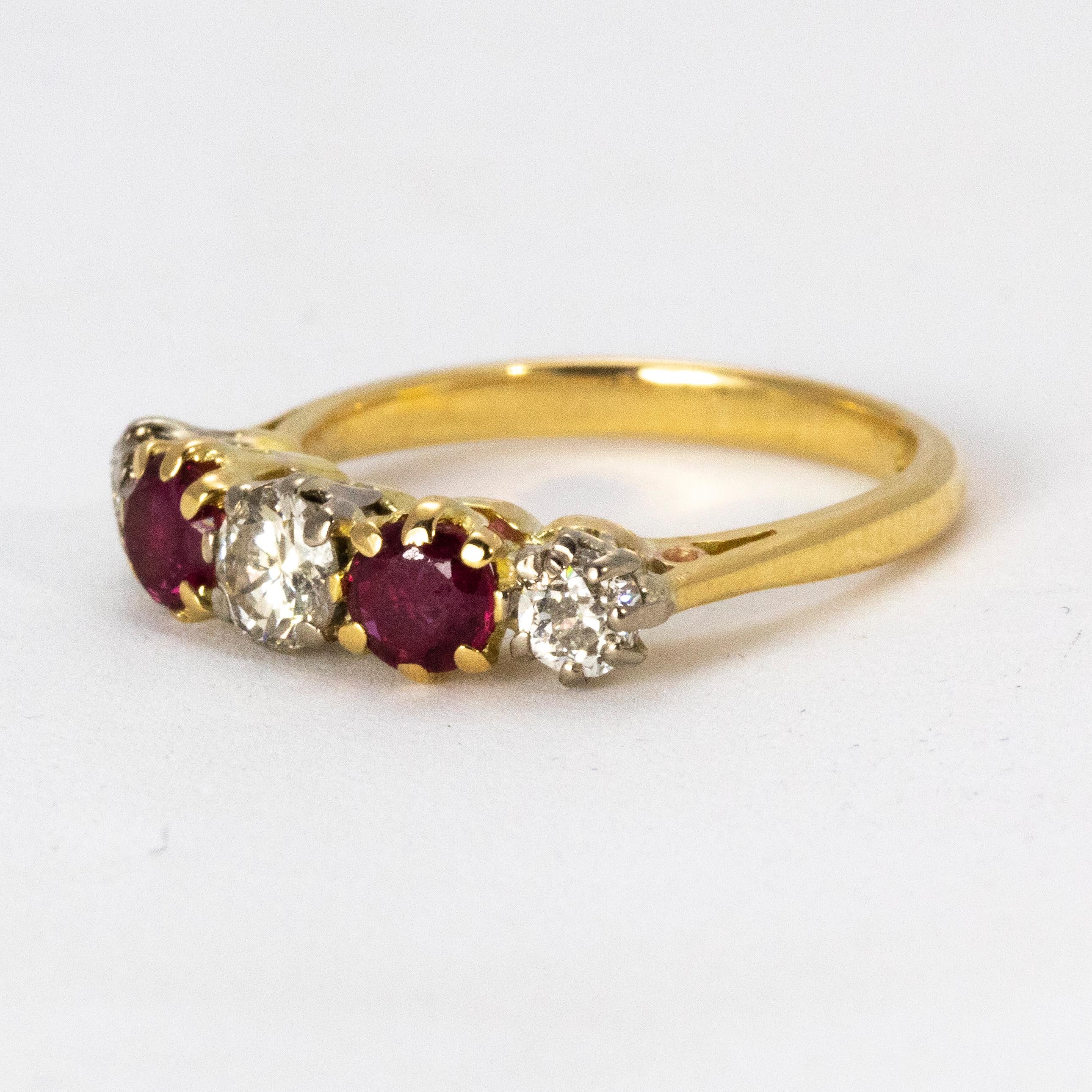 An Incredible Five Stone Ring from the Victorian period, boasting a pair of sublime rubies amongst a trio of bright diamonds. Total carat weight 1.25ct

Ring Size: L or 6