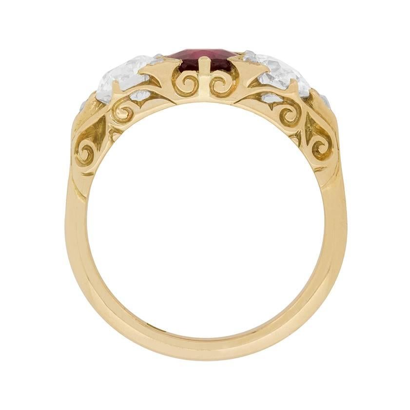 This breathtaking Victorian ring has a stunning deep red ruby in the centre weighing 1.40 carat. It has been certified by The Gem and Pearl Lab as natural and no treatment. It is beautifully set in the middle of two old cut diamonds each weighing