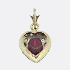 Pendentif en forme de médaillon en rubis victorien et diamant taillé à l'ancienne