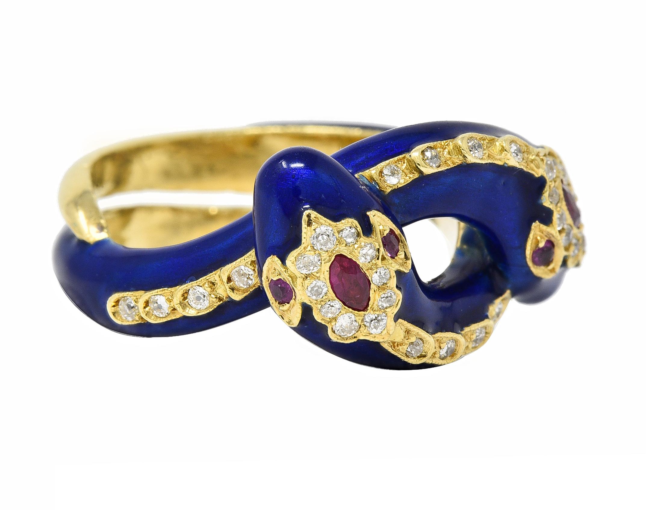 Designed as two entwined gold snakes with glossed enamel bodies
Transparent medium ultramarine blue in color - minimal loss
Centering navette-shaped rubies in heads and round cut ruby eyes
Weighing approximately 0.14 carat total - transparent bright
