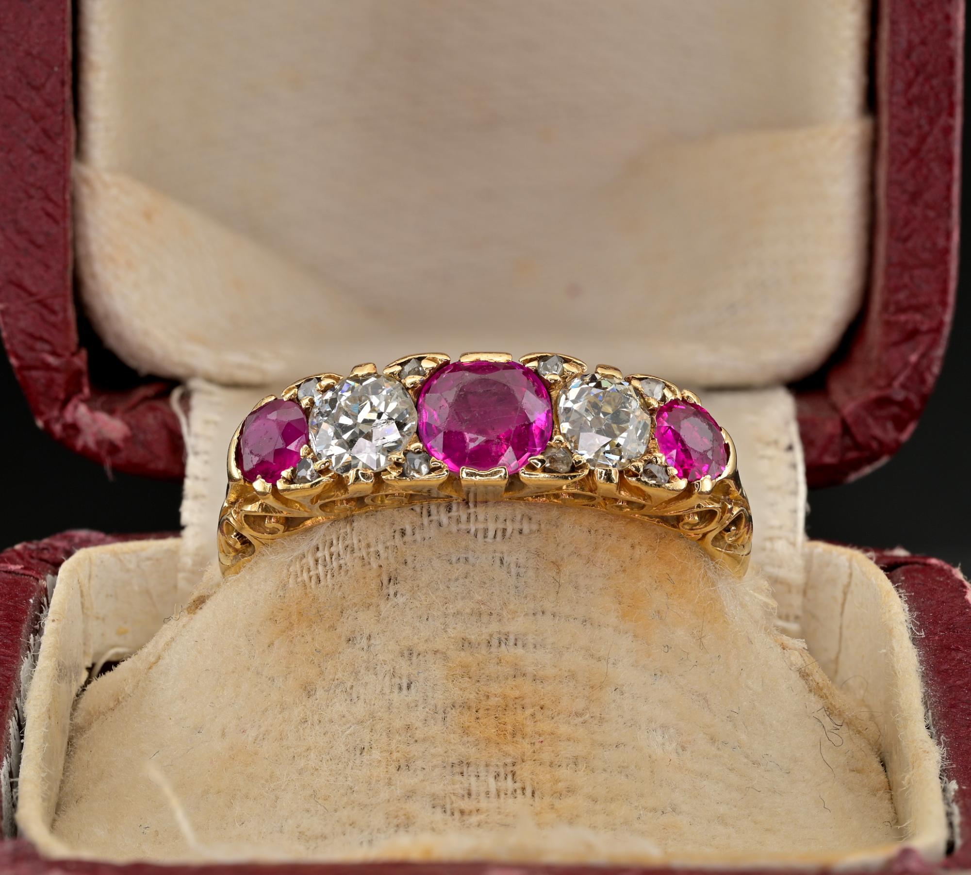 This very pretty antique Victorian period ring is 1890 ca.
English origin – bearing hallmarks
Traditional Victorian half hoop mount, beautiful  hand carved details exalting the fabulous Diamond & Ruby setting
Finely set with a composition of 3