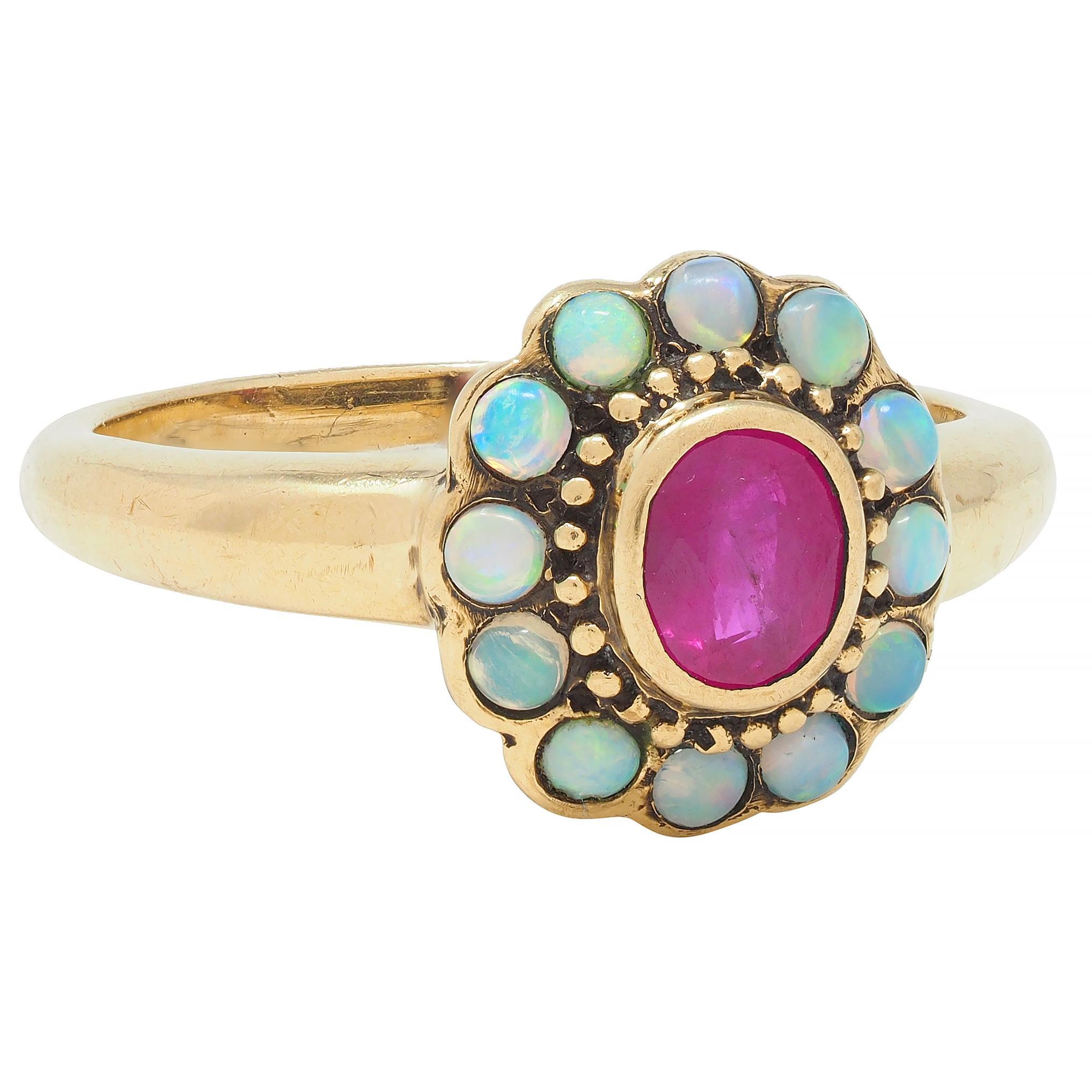Oval Cut Victorian Ruby Opal 9 Karat Yellow Gold Antique Halo Ring