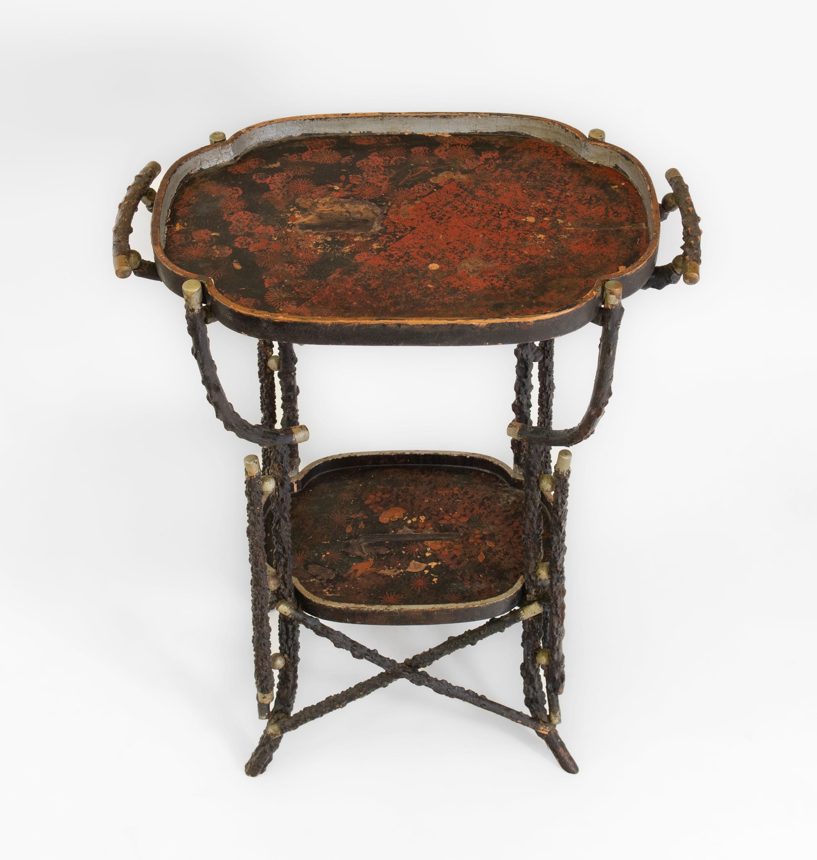 Unusual 19th Century rustic twig side table with lacquered top and tier. English - Circa 1880.

Delivery is INCLUDED in the price for all areas in MAINLAND England & Wales.

The table design comprises branches joined in a criss-cross pattern,