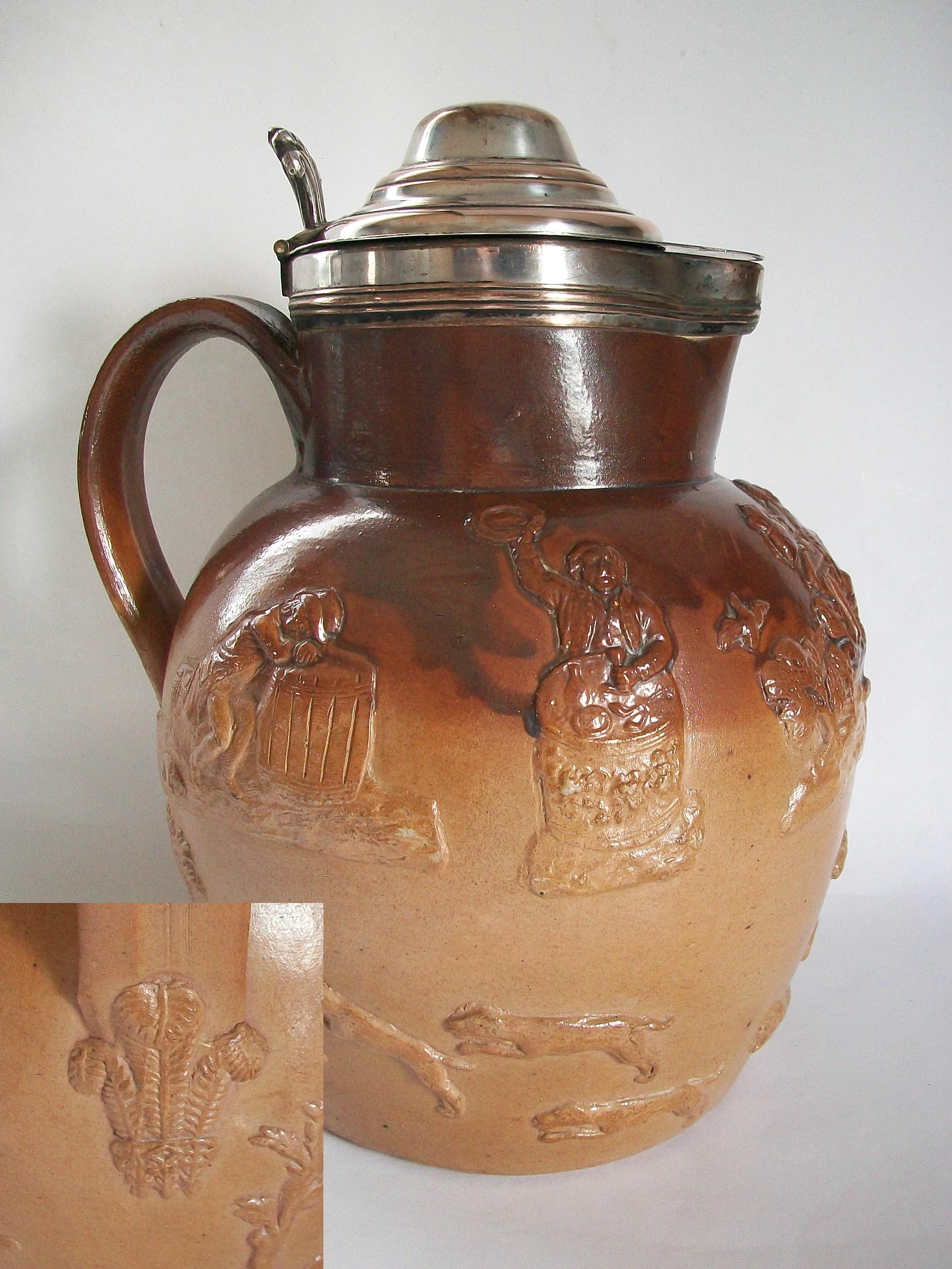 Victorian stoneware salt glaze ale pitcher with embossed 'hunt scene' and Prince of Wales feathers at the base of the handle - unglazed interior - unsigned - United Kingdom - 19th century.

Good antique condition - corrosion & silver plate loss to