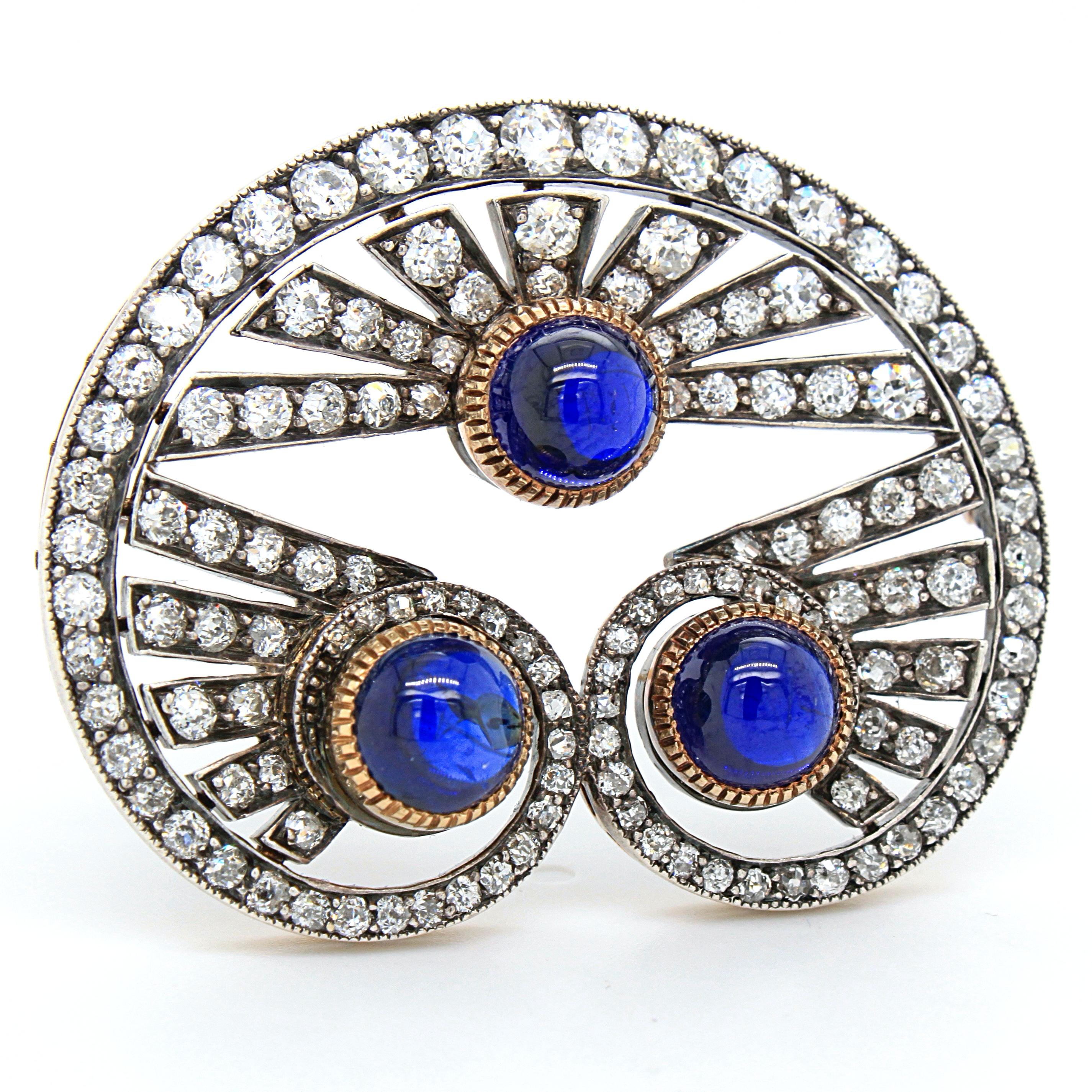 A very aesthetic and beautiful sapphire cabochon and old cut diamond brooch, Victorian, ca. 1880s. 

The three sapphire cabochons have a remarkable vivid blue colour, weighing approximately 4 carats in total. They are surrounded by old cut diamonds,