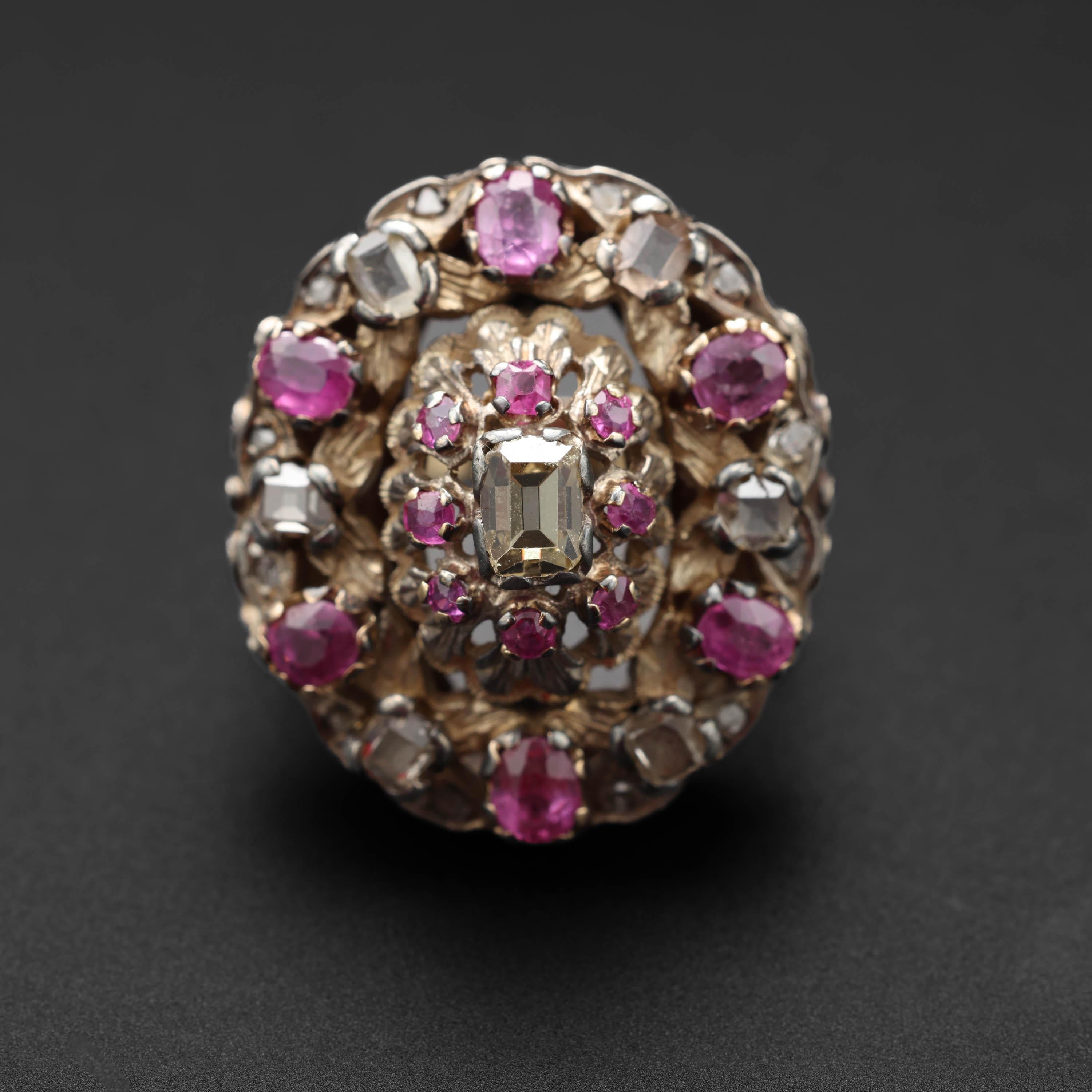 This Georgian-era (circa 1830)  ruby and table-cut diamond ring was created entirely by hand over two-hundred years ago, though the shank itself is more recent (though still antique). 

This impressive and rear ring features central table-cut