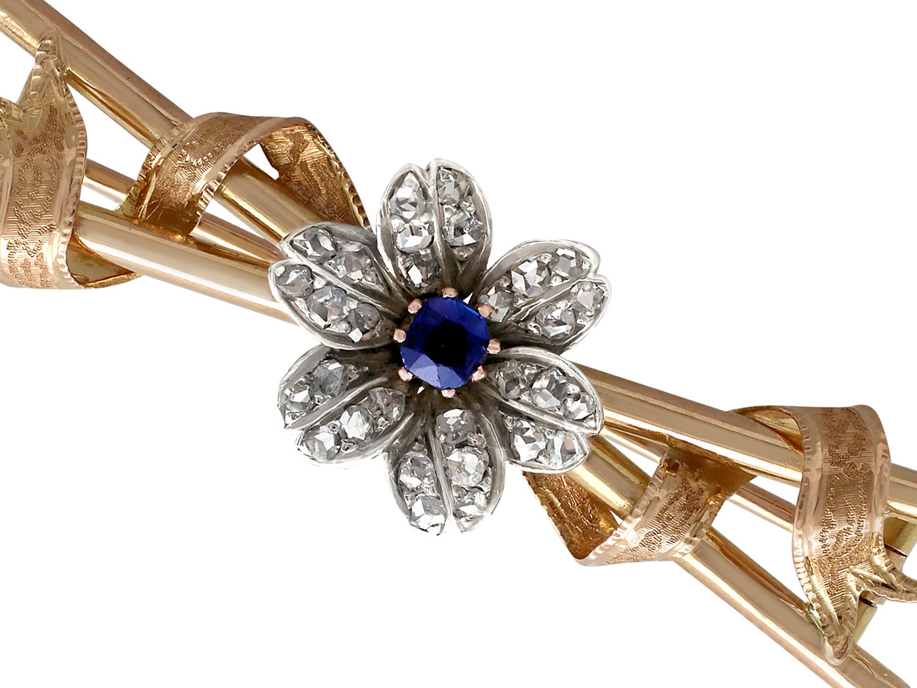 An impressive antique Victorian 0.22 carat sapphire and 0.48 carat diamond, 18 karat rose gold and silver set brooch; part of our diverse antique jewelry and estate jewelry collections.

This stunning, fine and impressive antique sapphire brooch has
