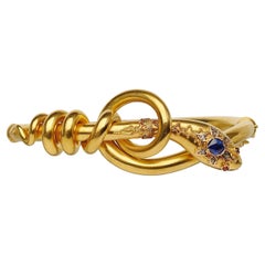 Bracelet jonc serpent victorien en or, saphirs, diamants et rubis, circa 1860