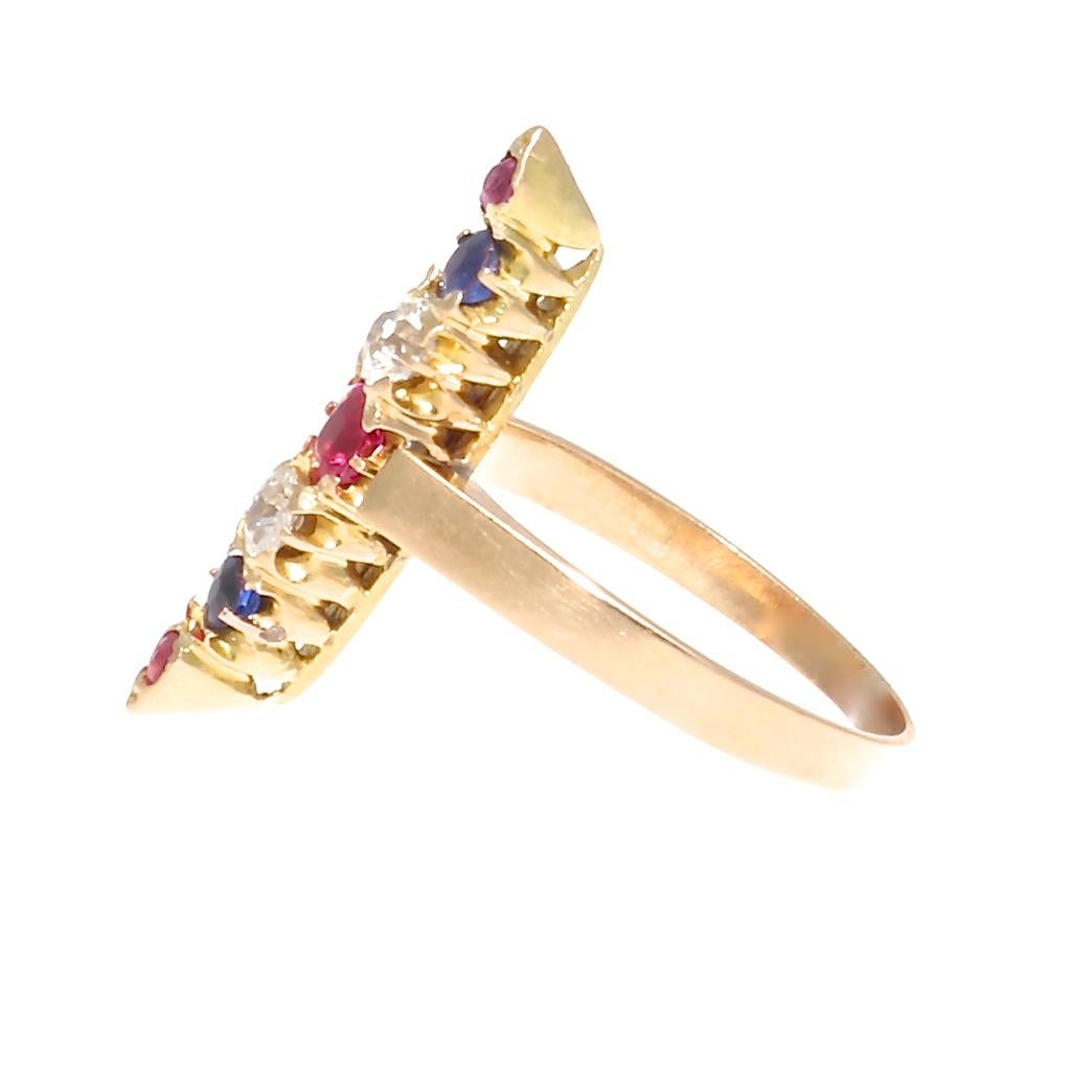 A linear creation of color and symmetry.  A singular and bold statement of style. Featuring red rubies, blue sapphires and white diamonds aligned perfectly in 18k yellow gold. Ring size 5-1/4 and can easily be resized to fit, if needed this would