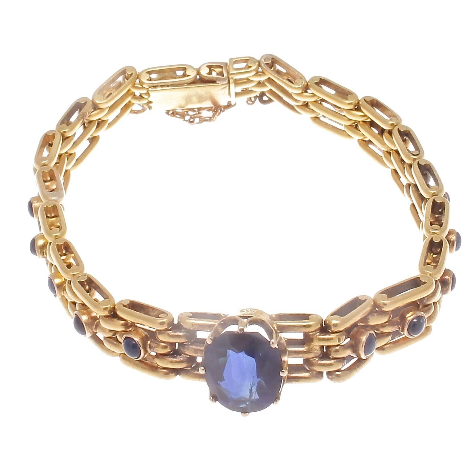 Inspired by the romantic period of the Victorian era when jewelry was vibrant and colorful, resembling the true love the Queen had for the King. Featuring an approximately 3 carat oval cut navy blue sapphire mounted amidst links of glistening 18k