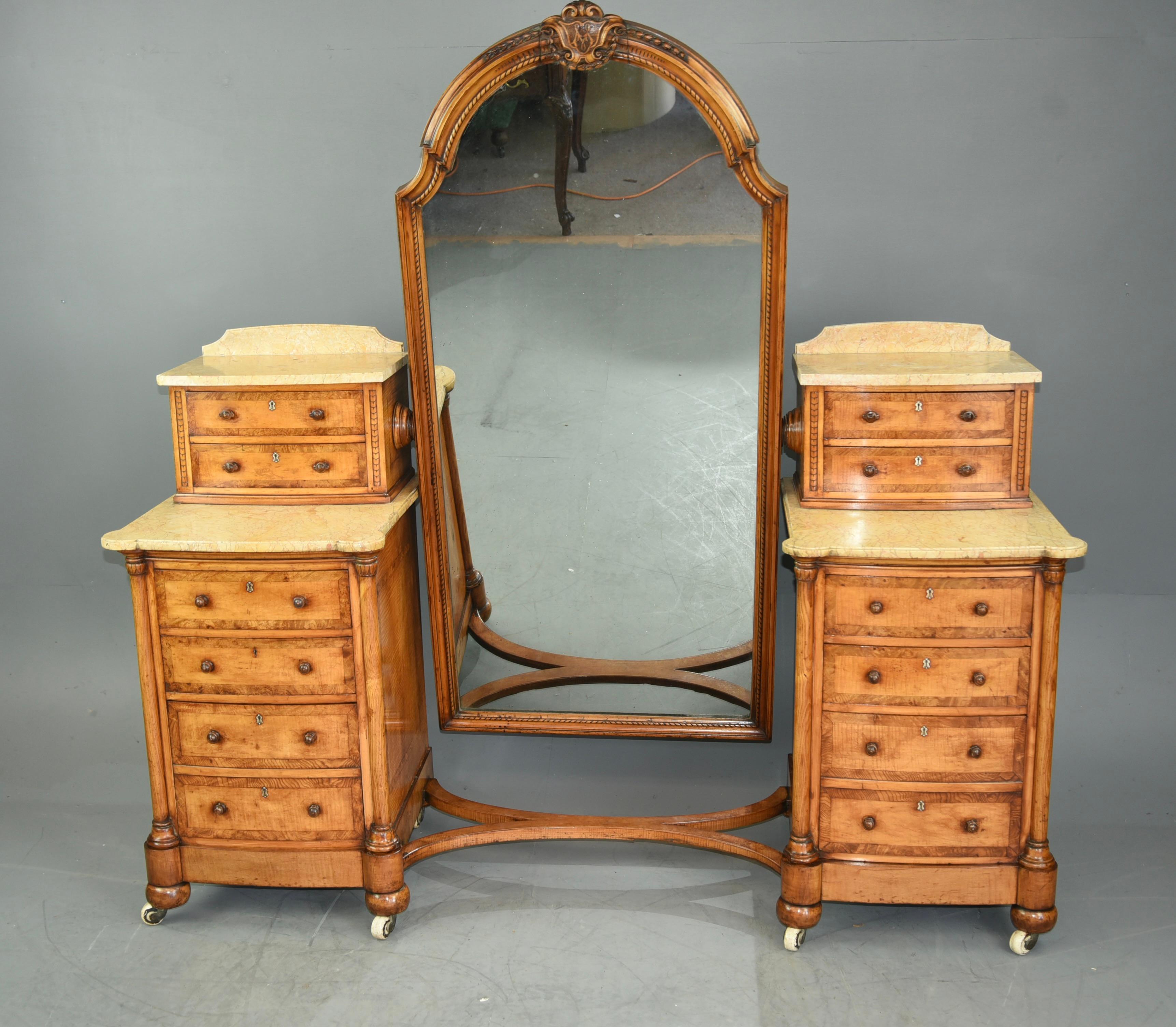 Fine quality rare Victorian satin wood pedestal dressing table and matching ottoman.
The dressing table has three drawers to each pedestal there is an additional two small drawers above.
The pedestal have original marble tops The mirror has an