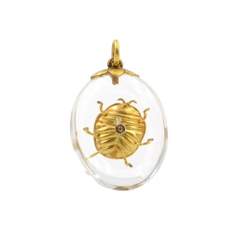 Victorian Rock crystal quartz pendant with genuine green scarab beetle, 18k yellow gold, circa 1900.  Just over 1.5 inches long.