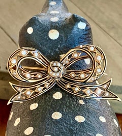 Victorian Seed Pearl and Enamel 14 Karat Yellow Gold Bow Brooch Pin