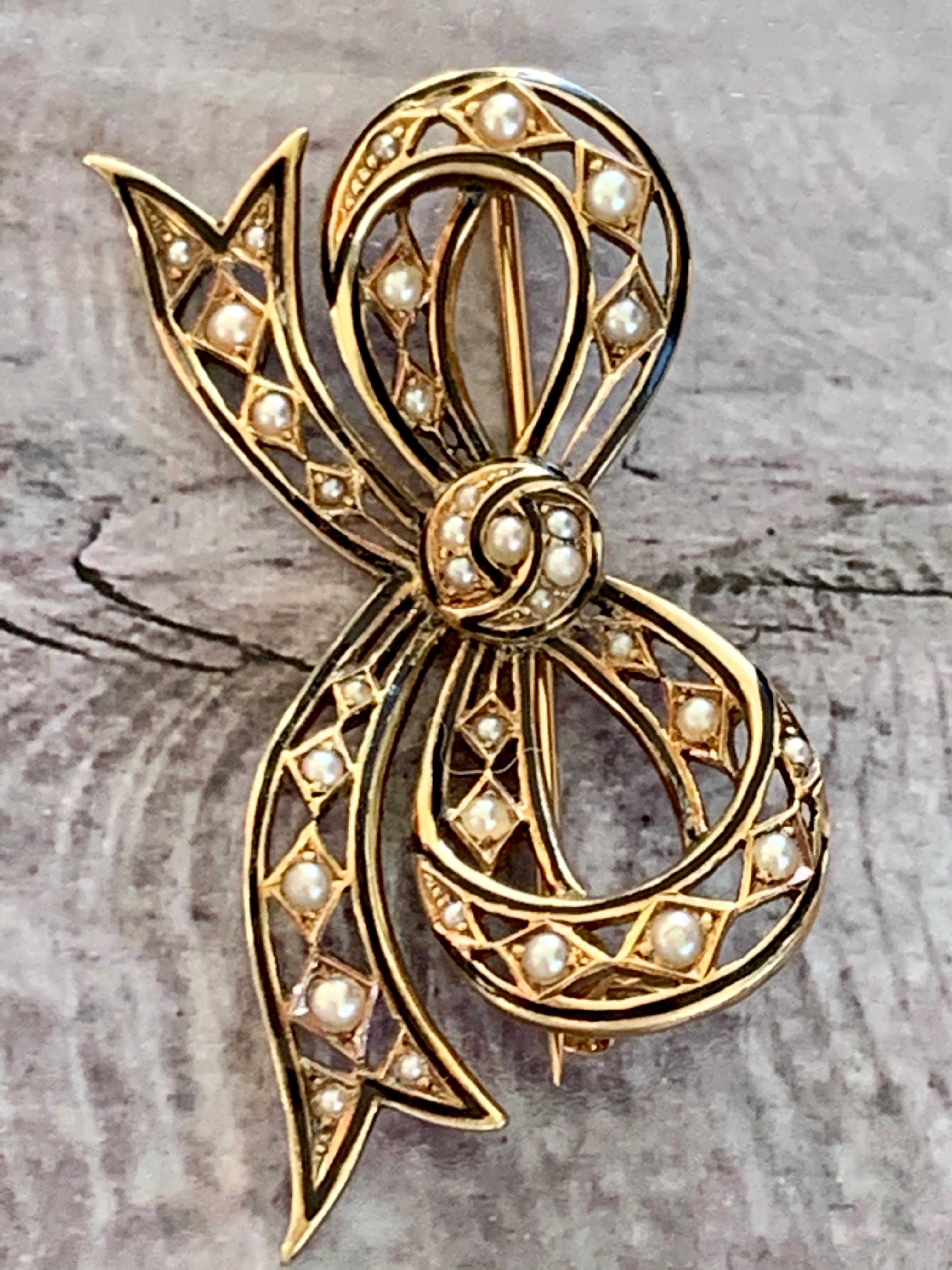 Women's Victorian Seed Pearl and Enamel 14 Karat Yellow Gold Bow Brooch Pin For Sale