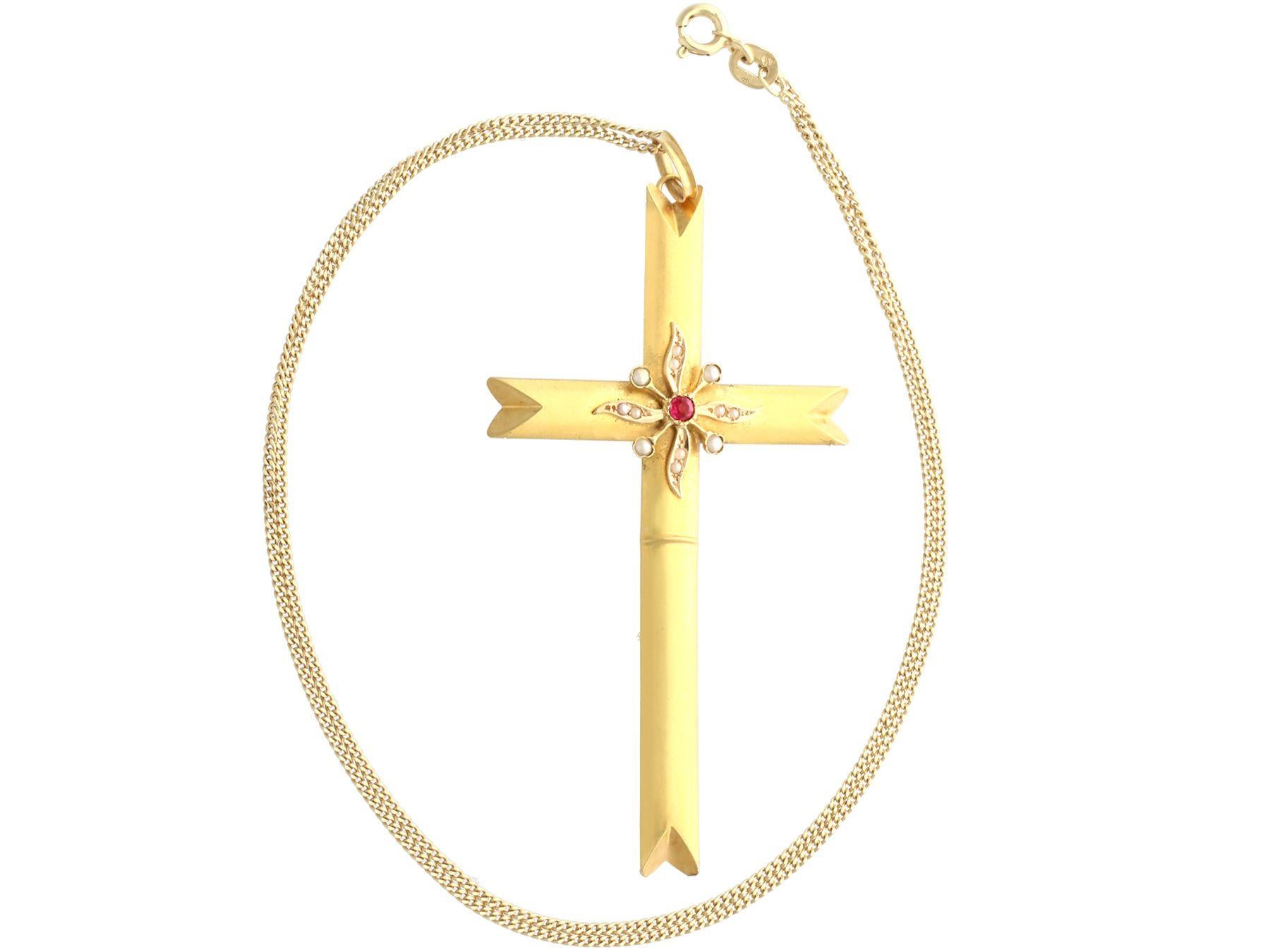 A fine and impressive antique Victorian seed pearl and imitation gemstone, 18k yellow gold cross pendant; part of our diverse antique jewelry and estate jewelry collections.

This fine and impressive antique pendant has been crafted in 18k yellow