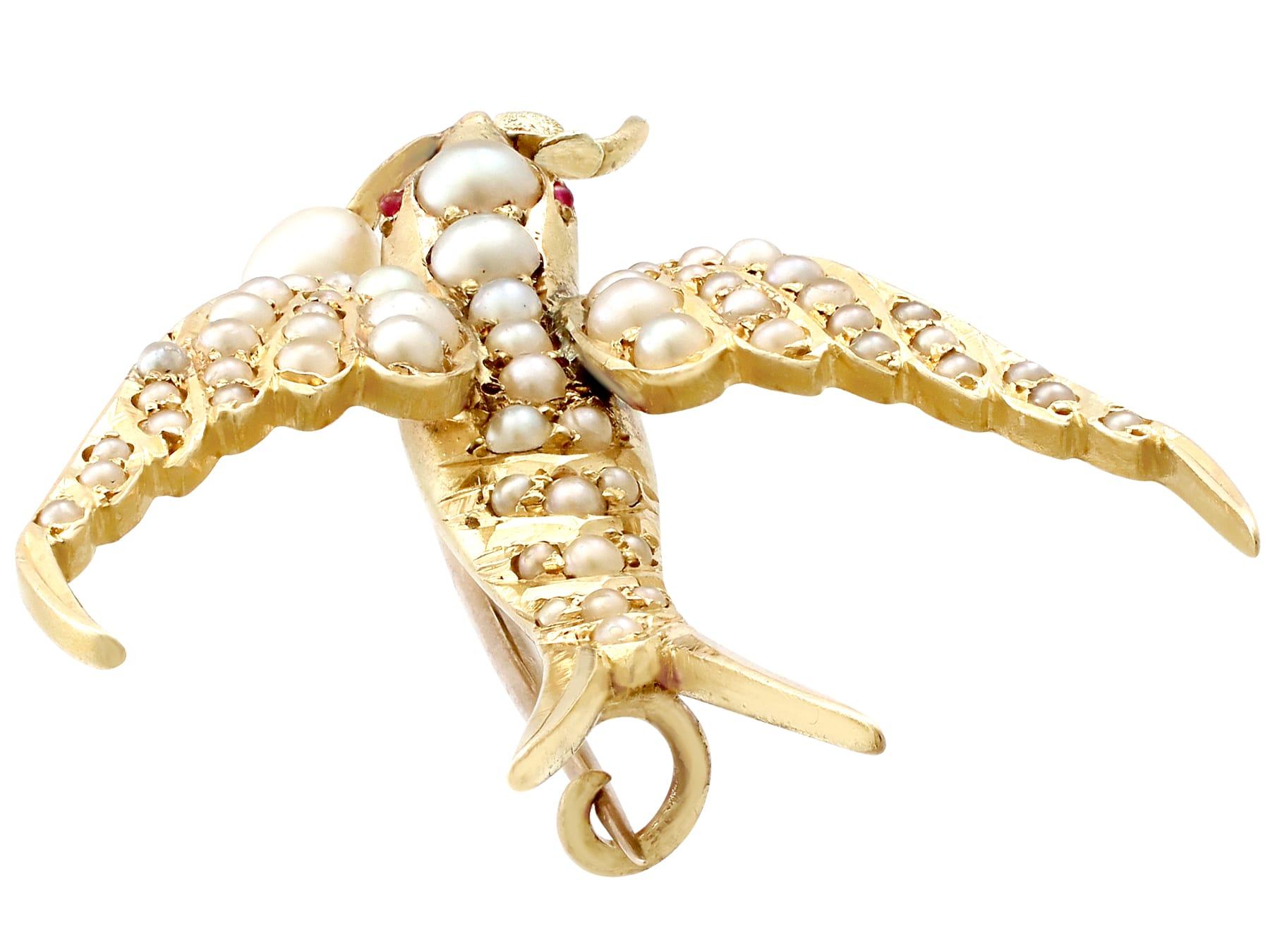 Round Cut Victorian Seed Pearl and Ruby Yellow Gold Bird Brooch For Sale