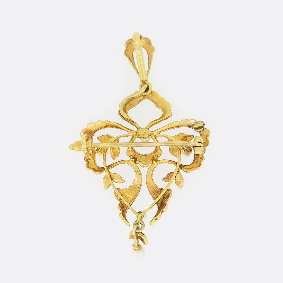 This is a Victorian 15ct yellow gold pendant which has been set with an array of natural seed pearls. The fine craftsmanship and elegant design is typical of the late Victorian era and the bottom pearl is allowed to dangle freely.

Condition: Used