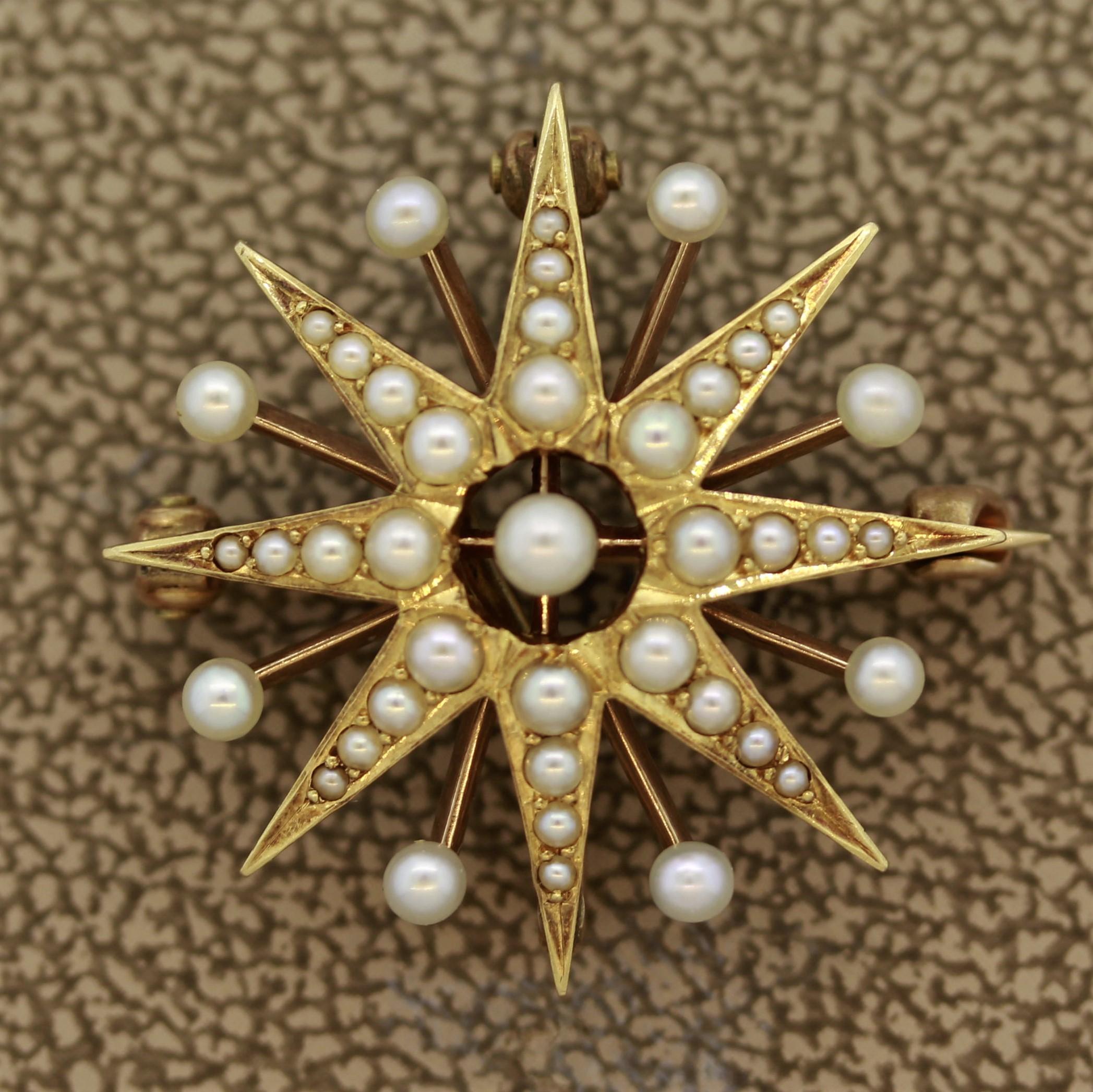 An antique from the turn of the 20th century, this starburst piece can be worn as a brooch or a simple chain can be added to the 2 bails for pendant wear. It is covered in natural seed pearls and made in 14k gold.

Length: 1 inch