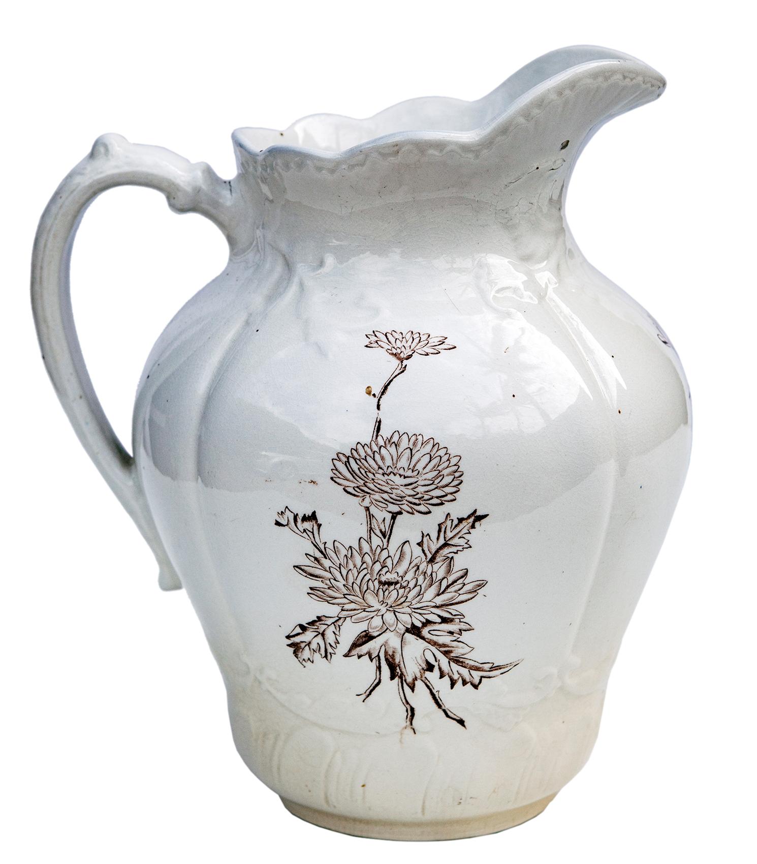 Antique ironstone white transferware pitcher with sepia tone chrysanthemums. 