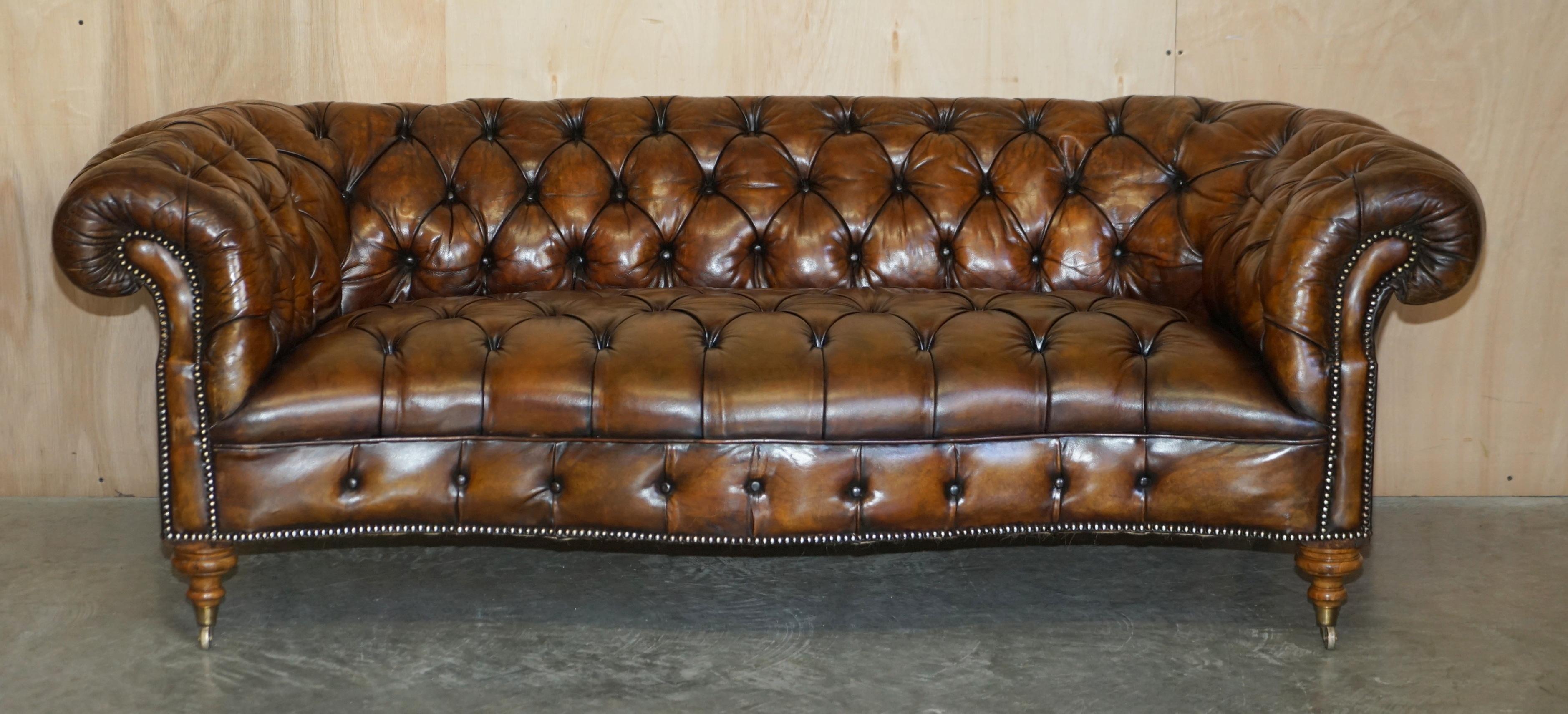 We are delighted to offer for sale this stunning fully restored Victorian hand dyed cigar brown leather serpentine fronted Chesterfield Tufted club sofa after Howard & Son's of Berners Street

This sofa is as rare as they come, it’s a period
