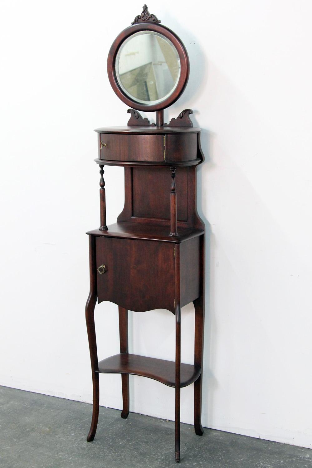 Victorian shaving stand with movable mirror.