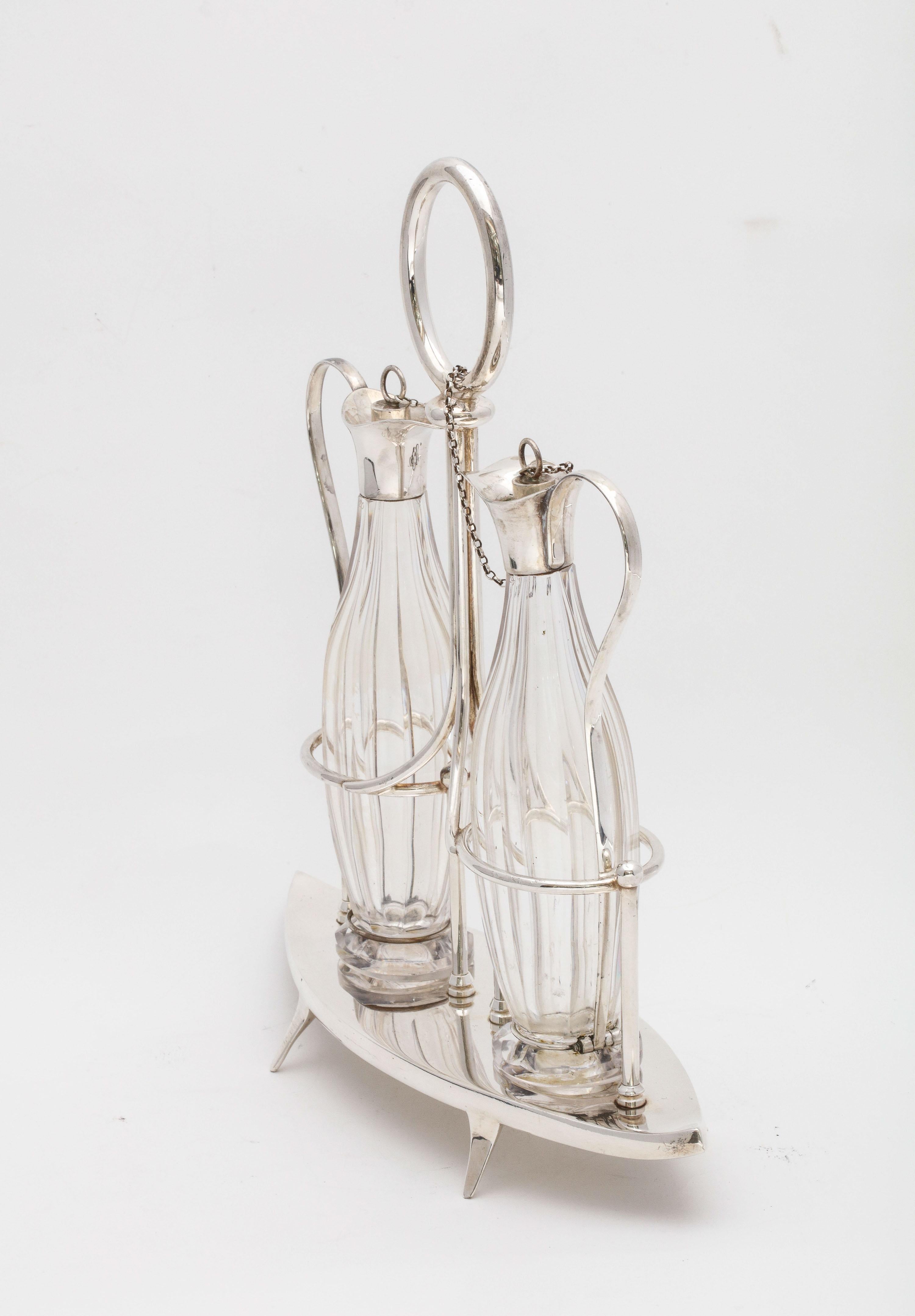 Victorian Sheffield Plate Footed Two-Bottle Cruet Set by William Hutton and Sons In Good Condition For Sale In New York, NY