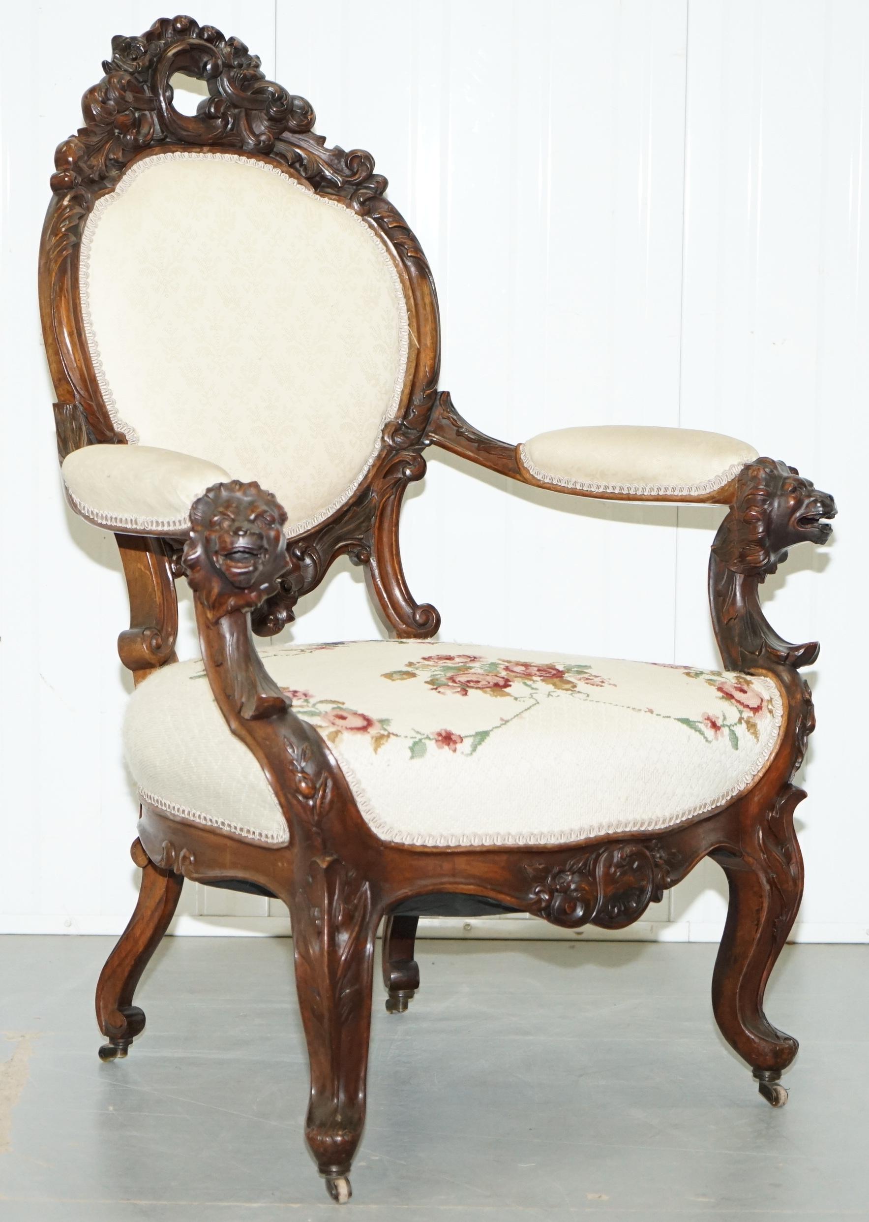 We are delighted to offer for sale this very rare Victorian hand carved show framed Salon armchair with Lion detailing and stamped castors

A good find, its rare to come across show framed salon armchairs with carving this ornate and in walnut