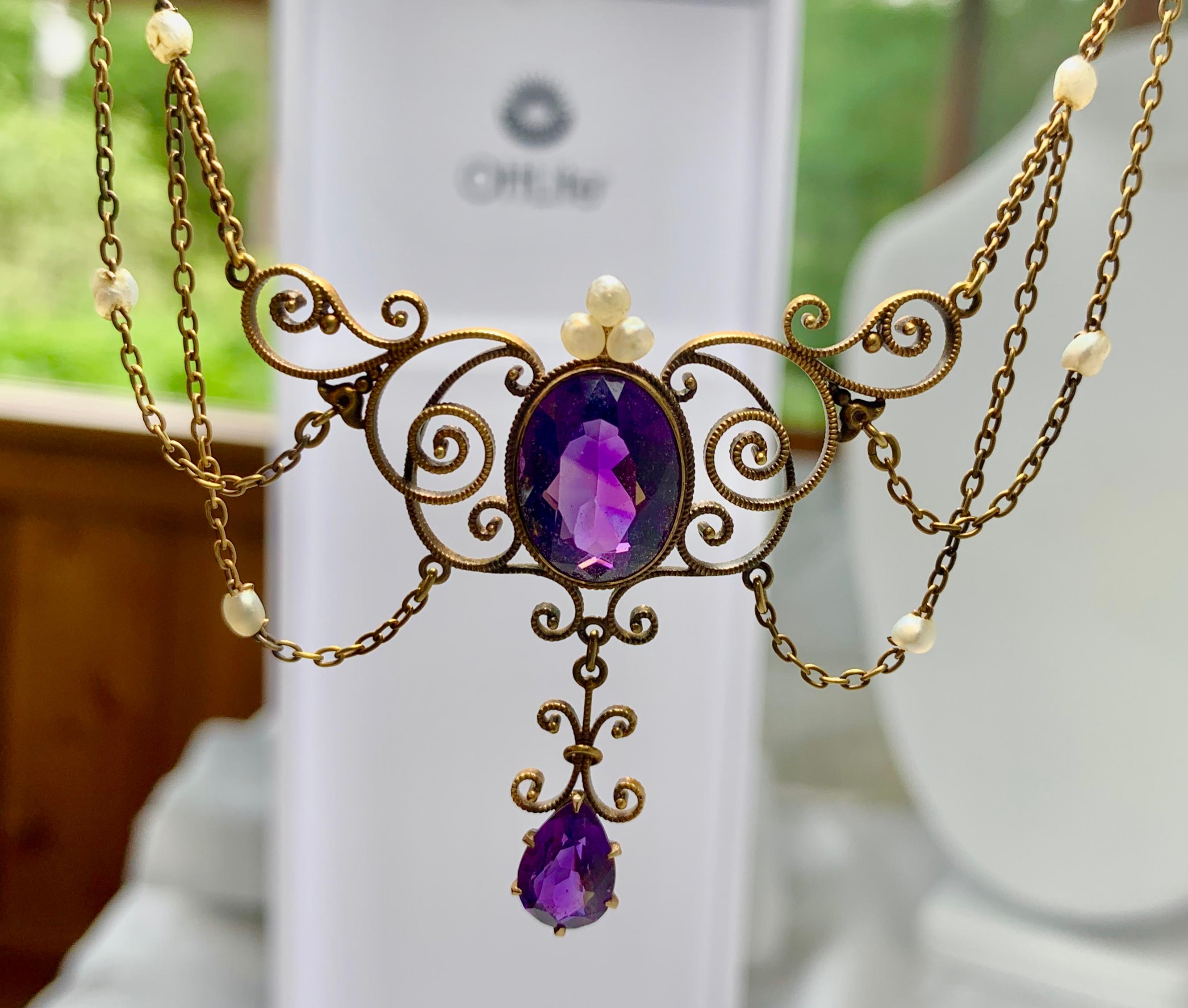 A STUNNING VICTORIAN - ART NOUVEAU - BELLE EPOQUE FESTOON NECKLACE WITH THE MOST GORGEOUS NATURAL OVAL SIBERIAN AMETHYST GEMS SET IN A GORGEOUS FILIGREE SETTING WITH SEED PEARLS IN AN OPEN WORK FESTOON SWAG DESIGN IN 14 KARAT ROSE GOLD DATING TO
