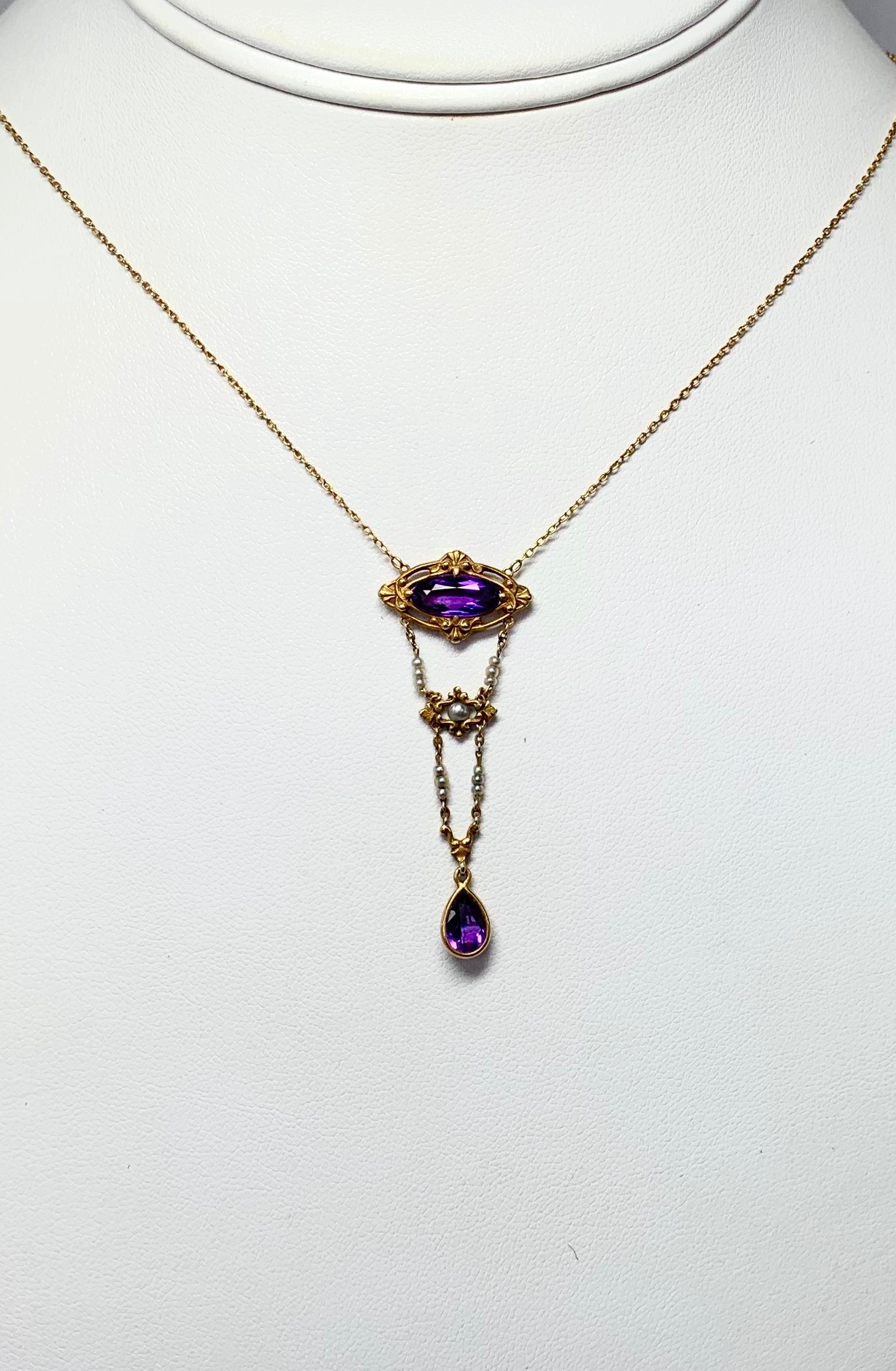 A STUNNING VICTORIAN - ART NOUVEAU - BELLE EPOQUE FESTOON NECKLACE WITH THE MOST GORGEOUS NATURAL SIBERIAN AMETHYST GEMS SET IN A GORGEOUS SETTING WITH SEED PEARLS IN AN OPEN WORK FESTOON LAVALIERE DESIGN IN 14 KARAT ROSE GOLD. DATING TO CIRCA 1880.