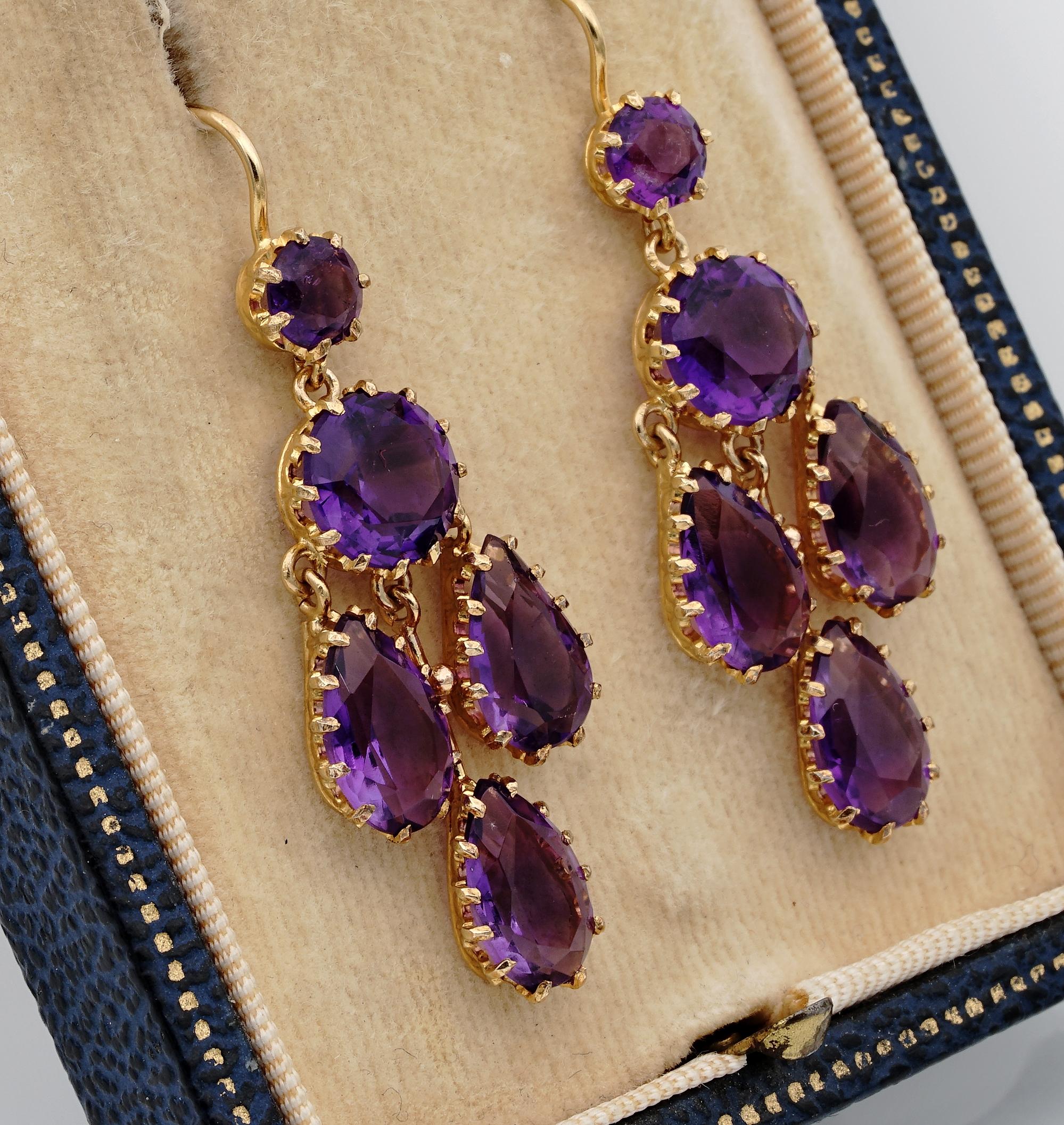 Wonderful Charm!

The finest Amethyst color is a strong reddish purple from the Siberian mine, rare to get and sought after by collectors and dealers worldwide
This amazing Victorian pair of chandelier earrings are made of multi drops and round cuts