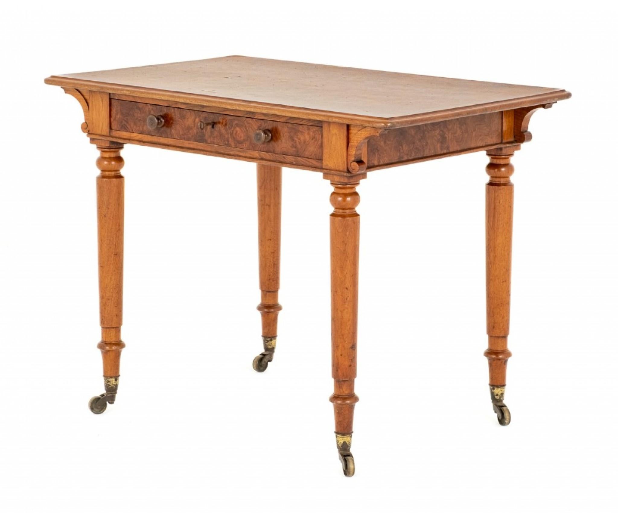 Burr Walnut Side Table (Holland and Co)
circa 1870
This Quality Table is Raised upon Crisp Ring Turned Legs with Brass Castors.
The Table Features 1 x Mahogany Lined Drawer with the Stamp of Holland and Co.
The Top of the Table Having Wonderful