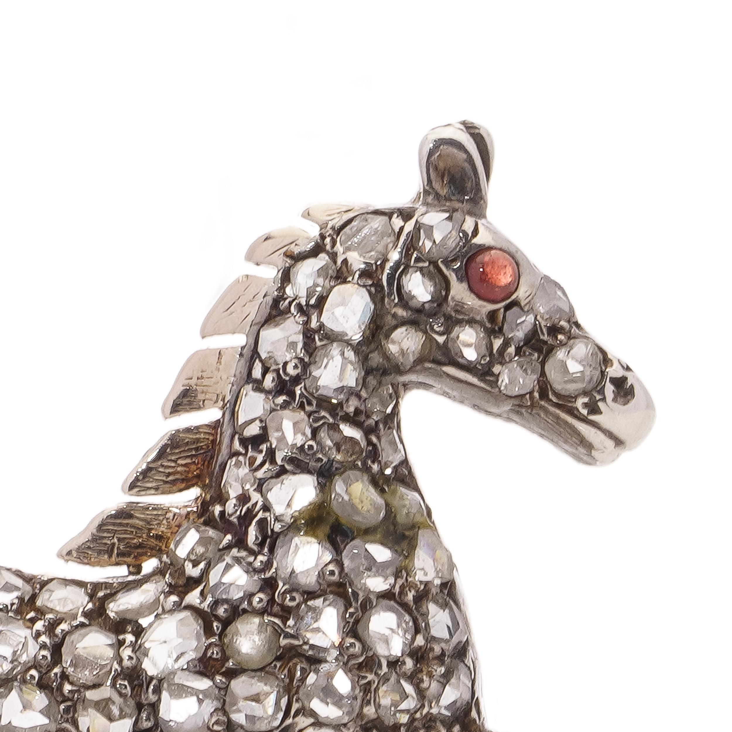Victorian silver and 9kt gold plated back, horse brooch with rose cut diamonds and cabochon ruby.
Made in England, Circa 1860's.
X - ray been tested positive for 9kt. gold and silver. 

The dimensions -
Size: 3.7 x 2.5 x 0.6 cm
Weight: 5.1